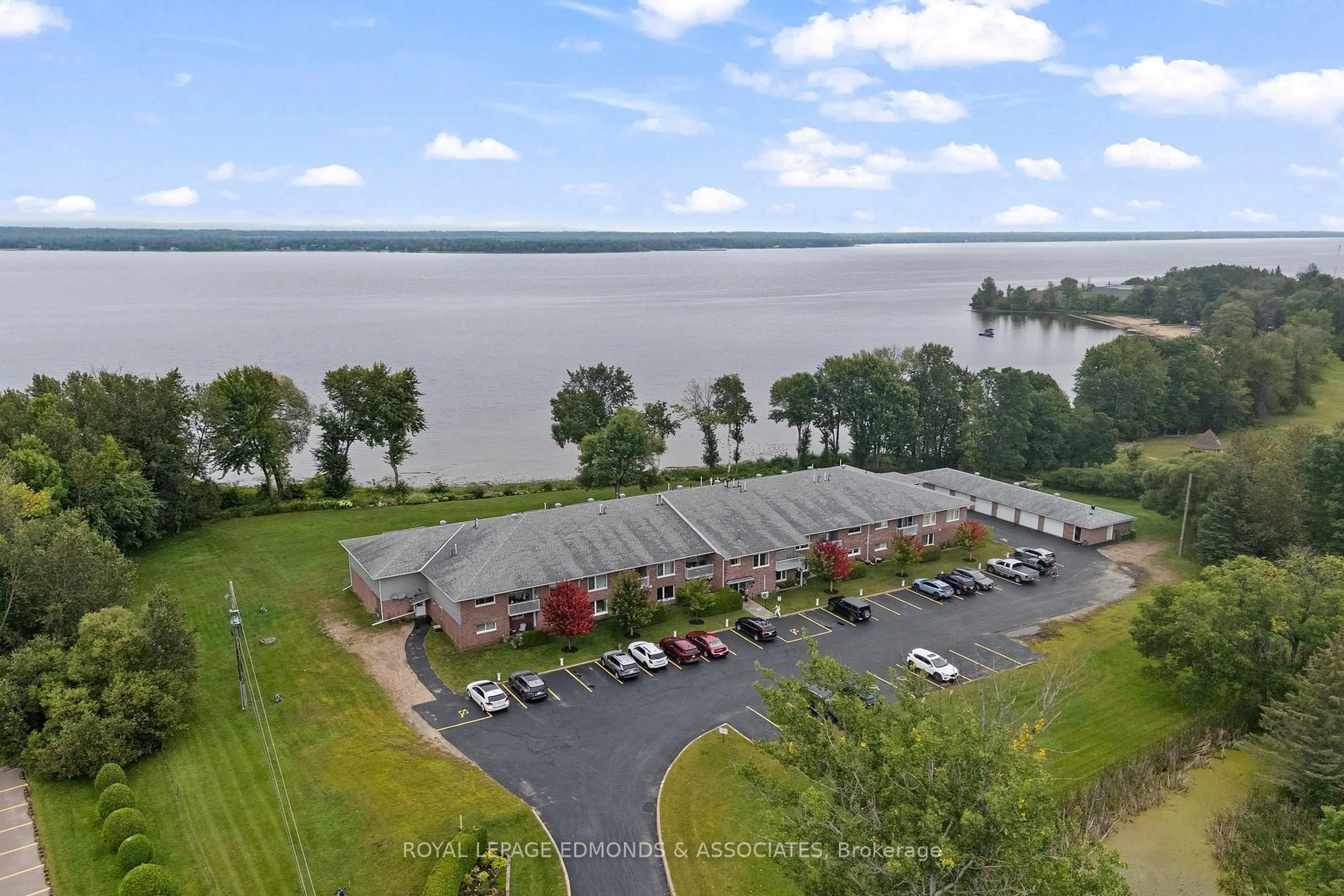 A pic from outside/outdoor area/front of a property/back of a property/a pic from drone, water/lake/river/ocean view for 1 Crandall St #212, Pembroke Ontario K8A 8M6