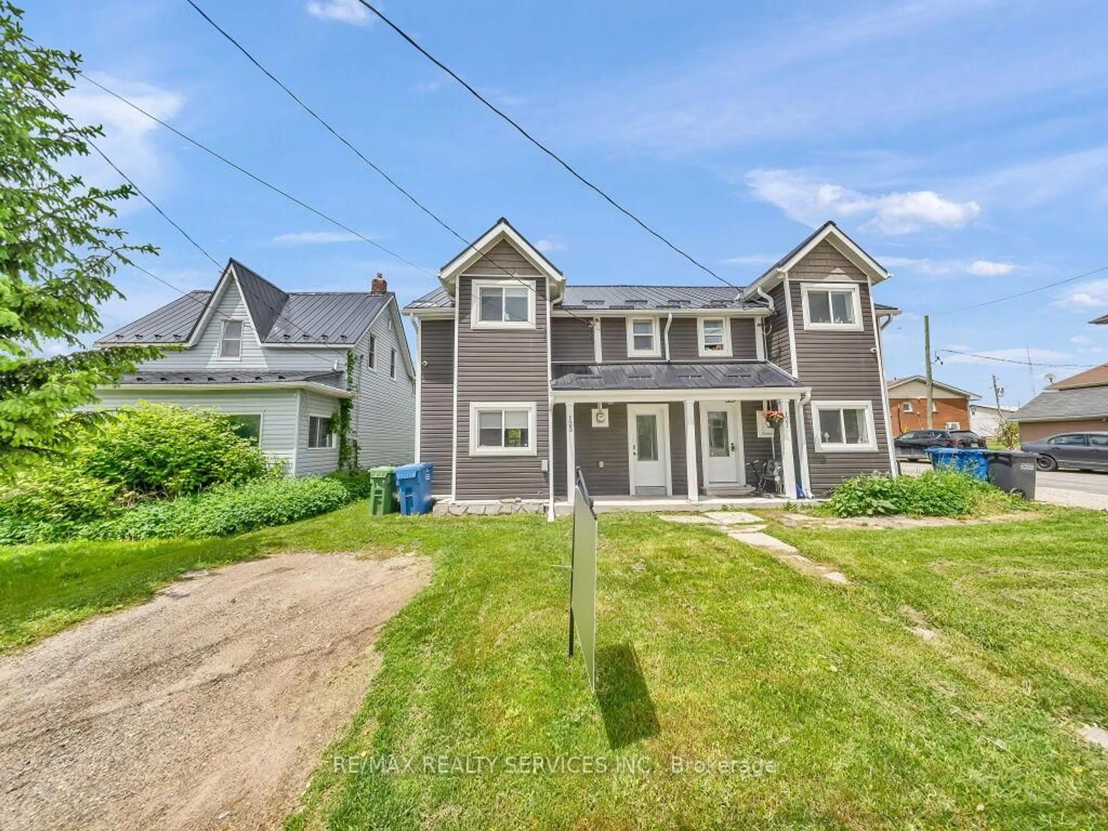 A pic from outside/outdoor area/front of a property/back of a property/a pic from drone, street for 123 Main St, Southgate Ontario N0C 1B0