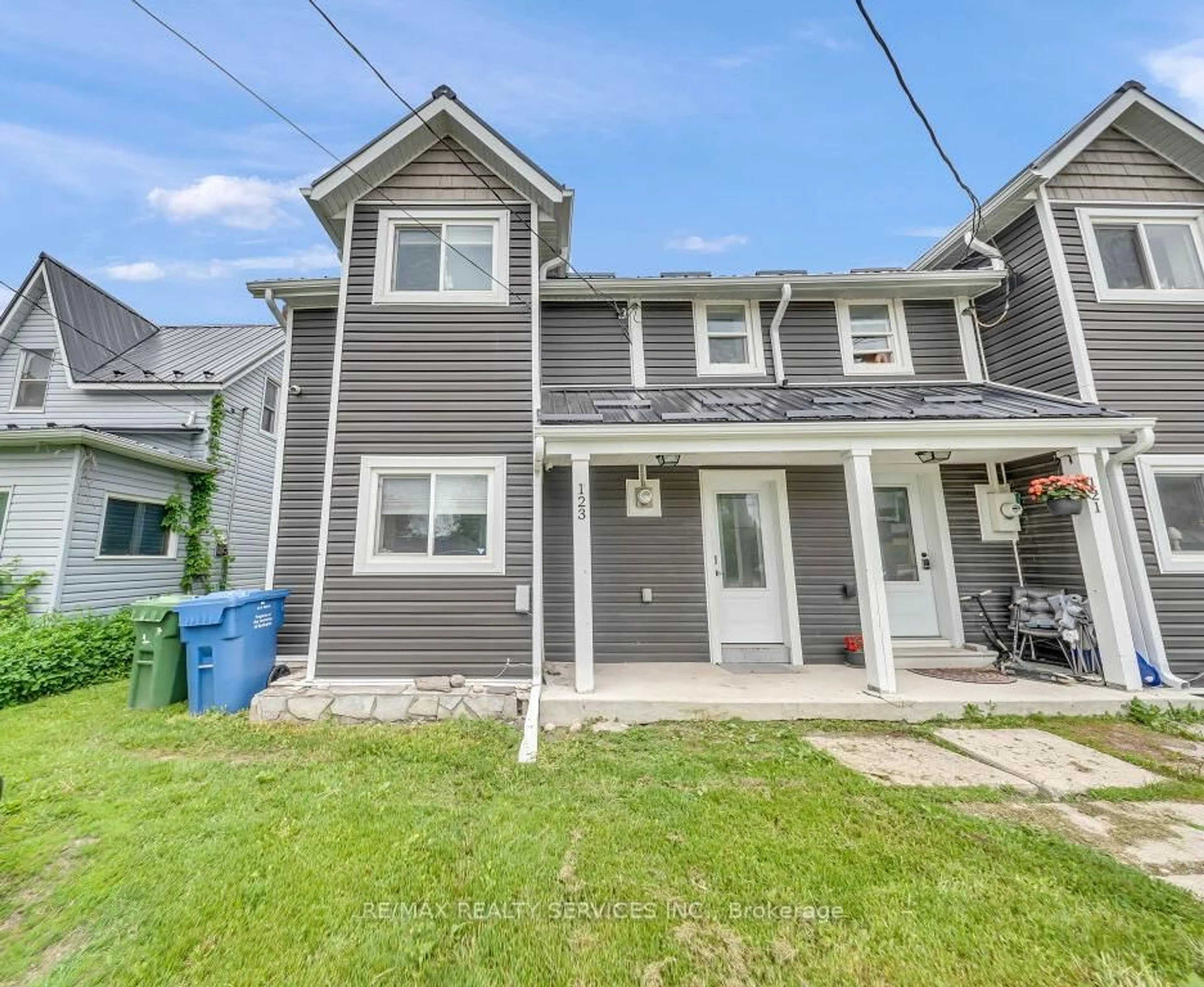 Home with vinyl exterior material, street for 123 Main St, Southgate Ontario N0C 1B0