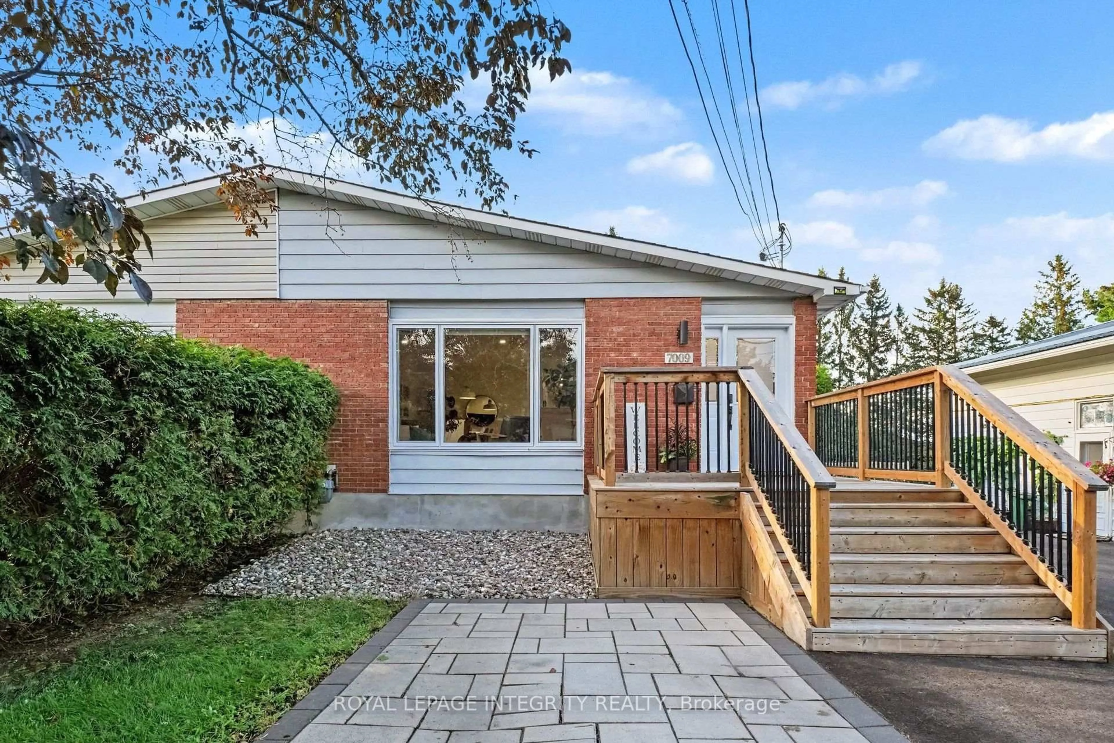 Home with brick exterior material, street for 7009 Notre Dame St, Ottawa Ontario K1C 1H8