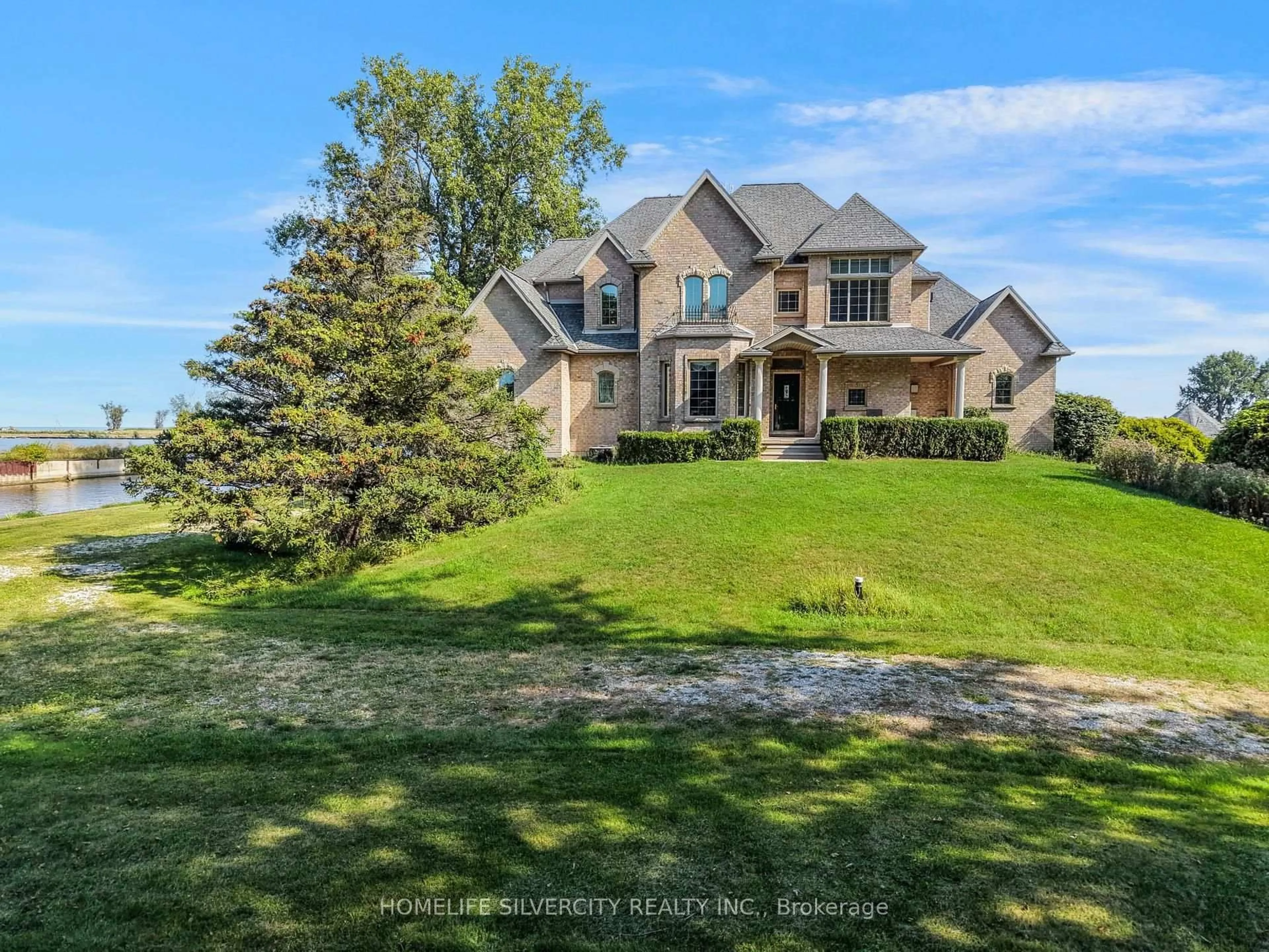 A pic from outside/outdoor area/front of a property/back of a property/a pic from drone, unknown for 21000 Admiral Dr, Lakeshore Ontario N0P 2L0