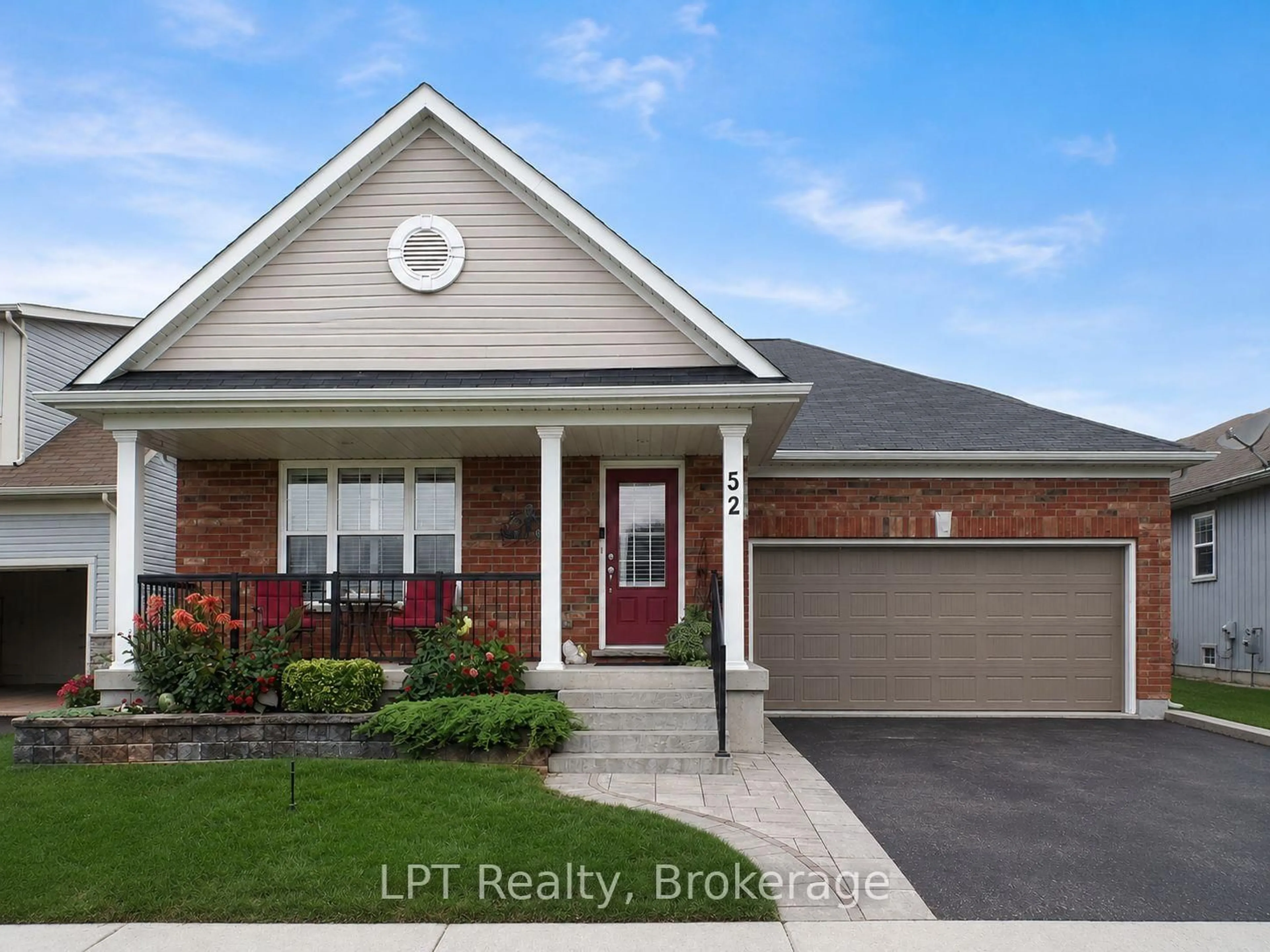 Home with brick exterior material, street for 52 Bridges Blvd, Port Hope Ontario L1A 0C8