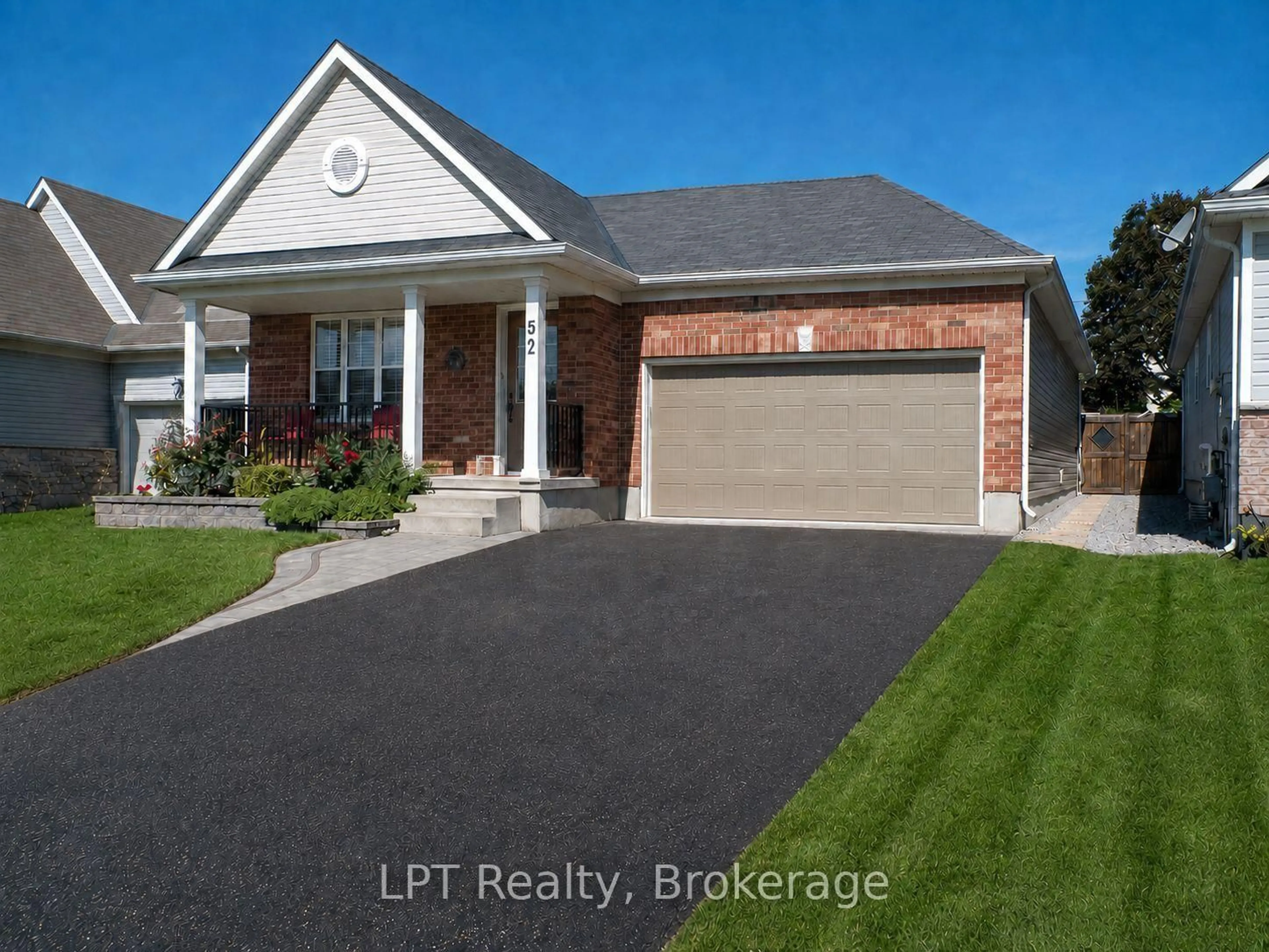 Home with brick exterior material, street for 52 Bridges Blvd, Port Hope Ontario L1A 0C8