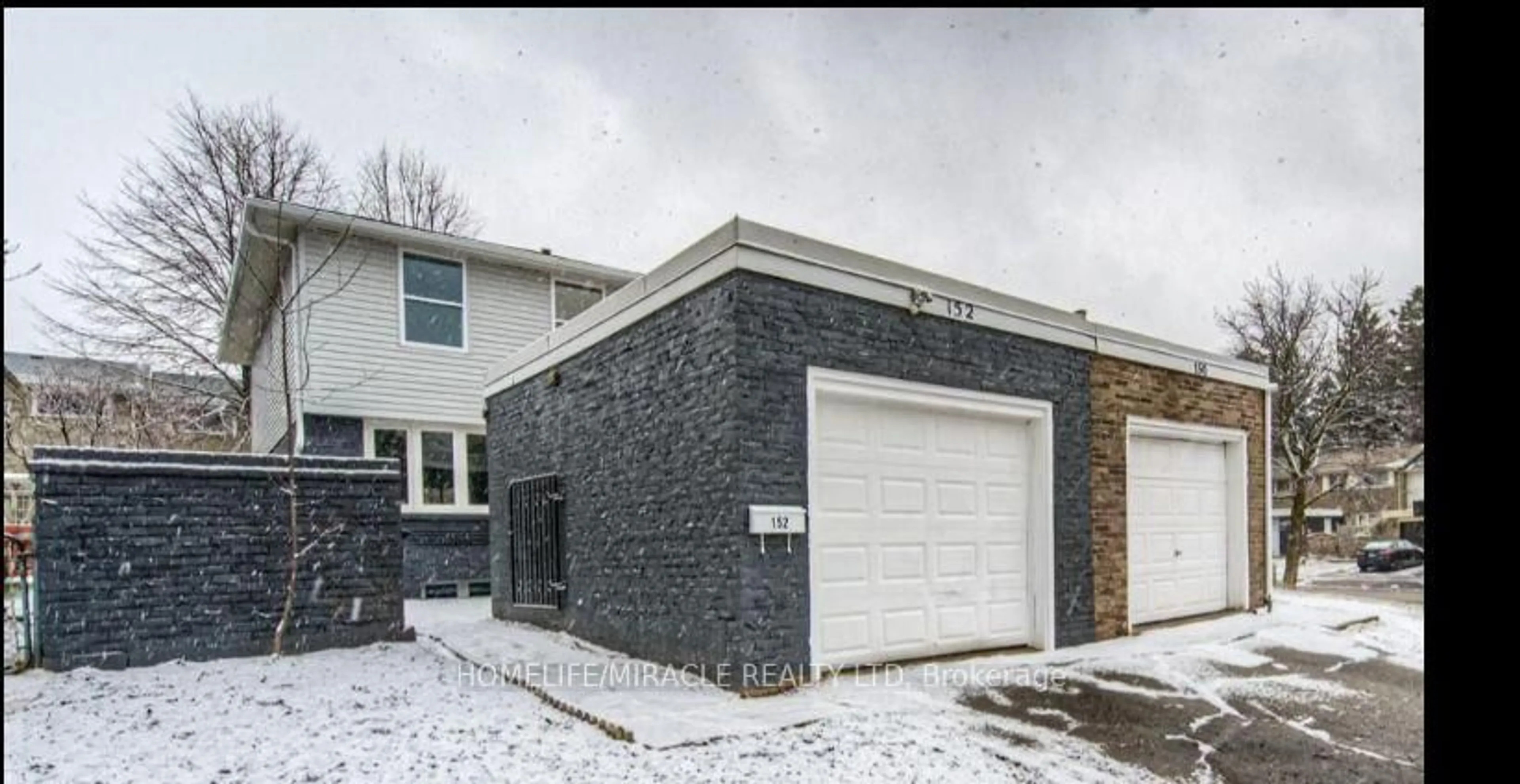 Home with brick exterior material, street for 152 Overlea Dr, Kitchener Ontario N2M 1T3
