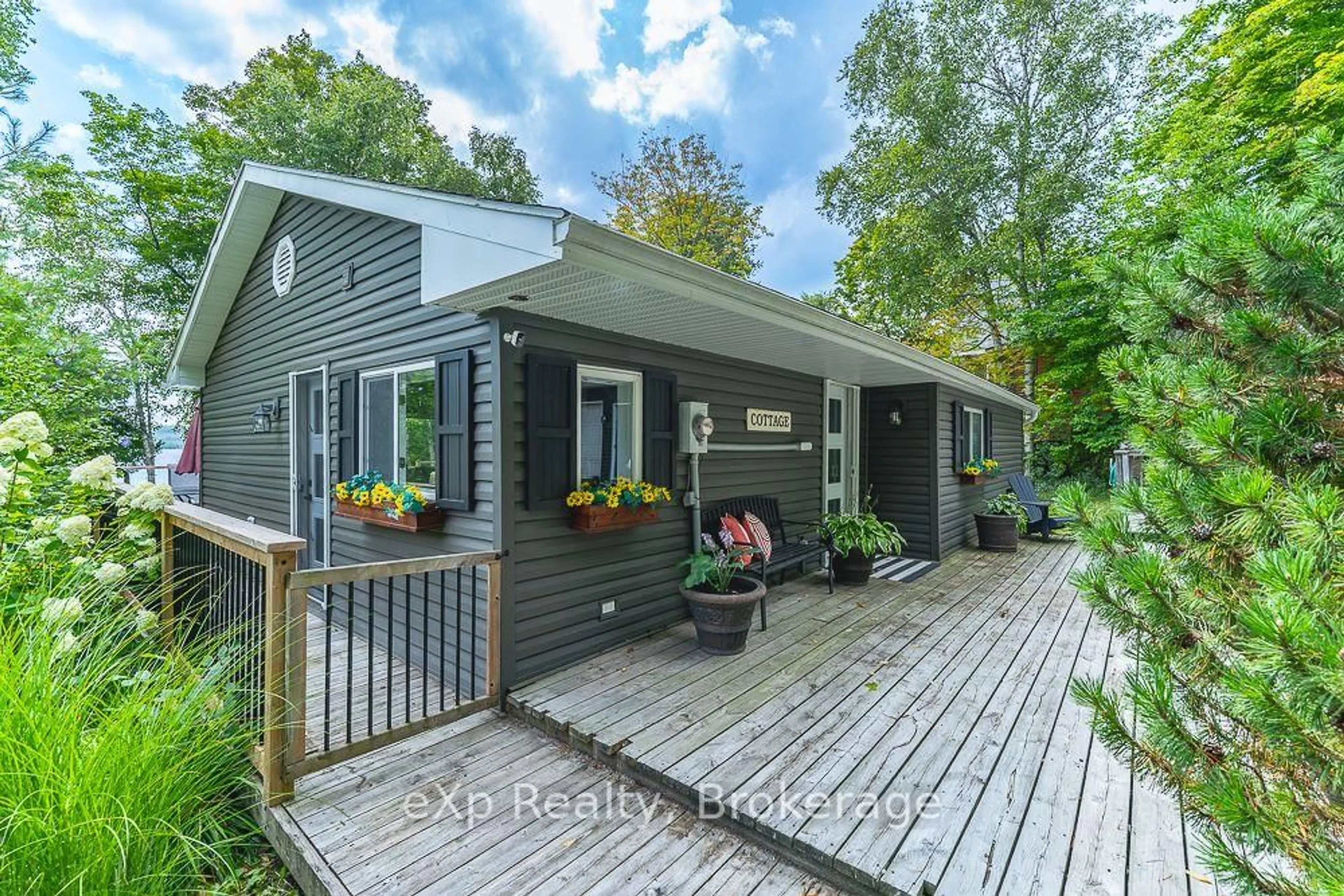 Home with vinyl exterior material, street for 1 1st Ave, South Bruce Peninsula Ontario N0H 2T0