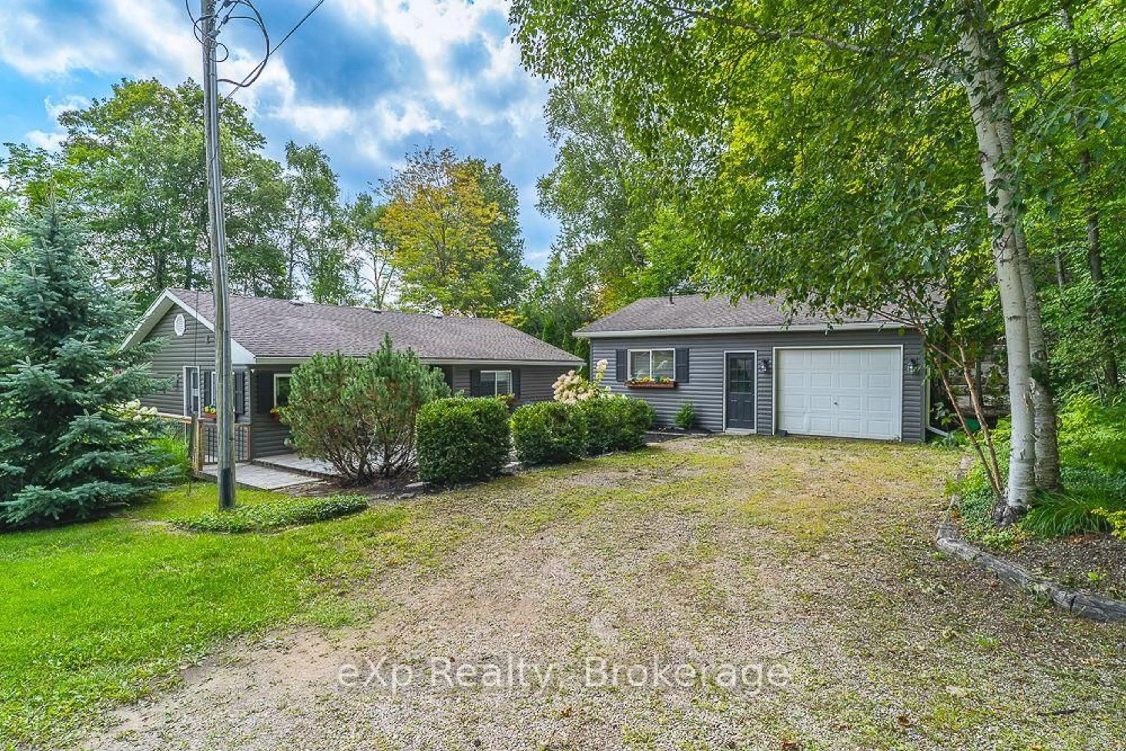 A pic from outside/outdoor area/front of a property/back of a property/a pic from drone, street for 1 1st Ave, South Bruce Peninsula Ontario N0H 2T0