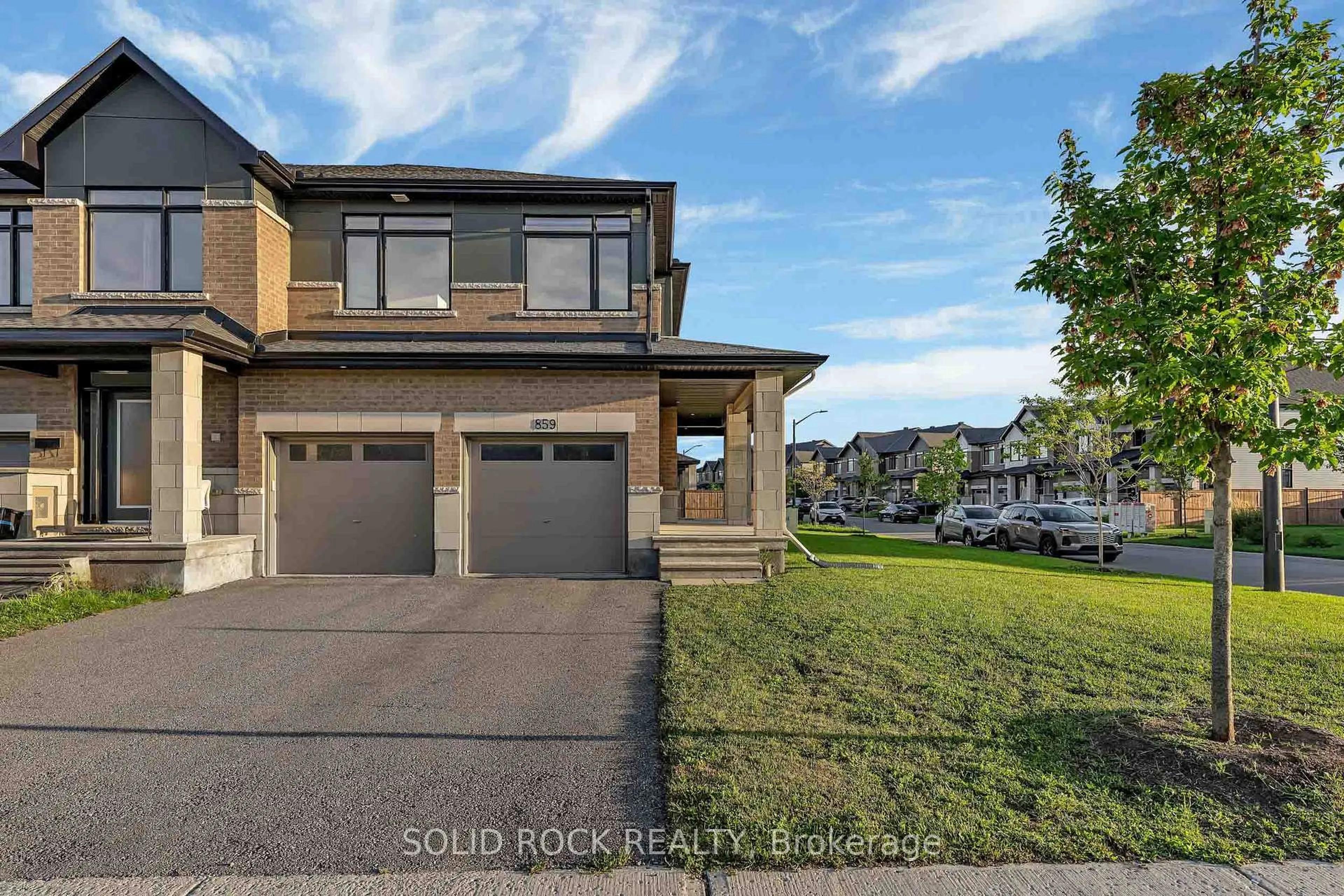 A pic from outside/outdoor area/front of a property/back of a property/a pic from drone, street for 859 Solarium Ave, Ottawa Ontario K4M 0H1