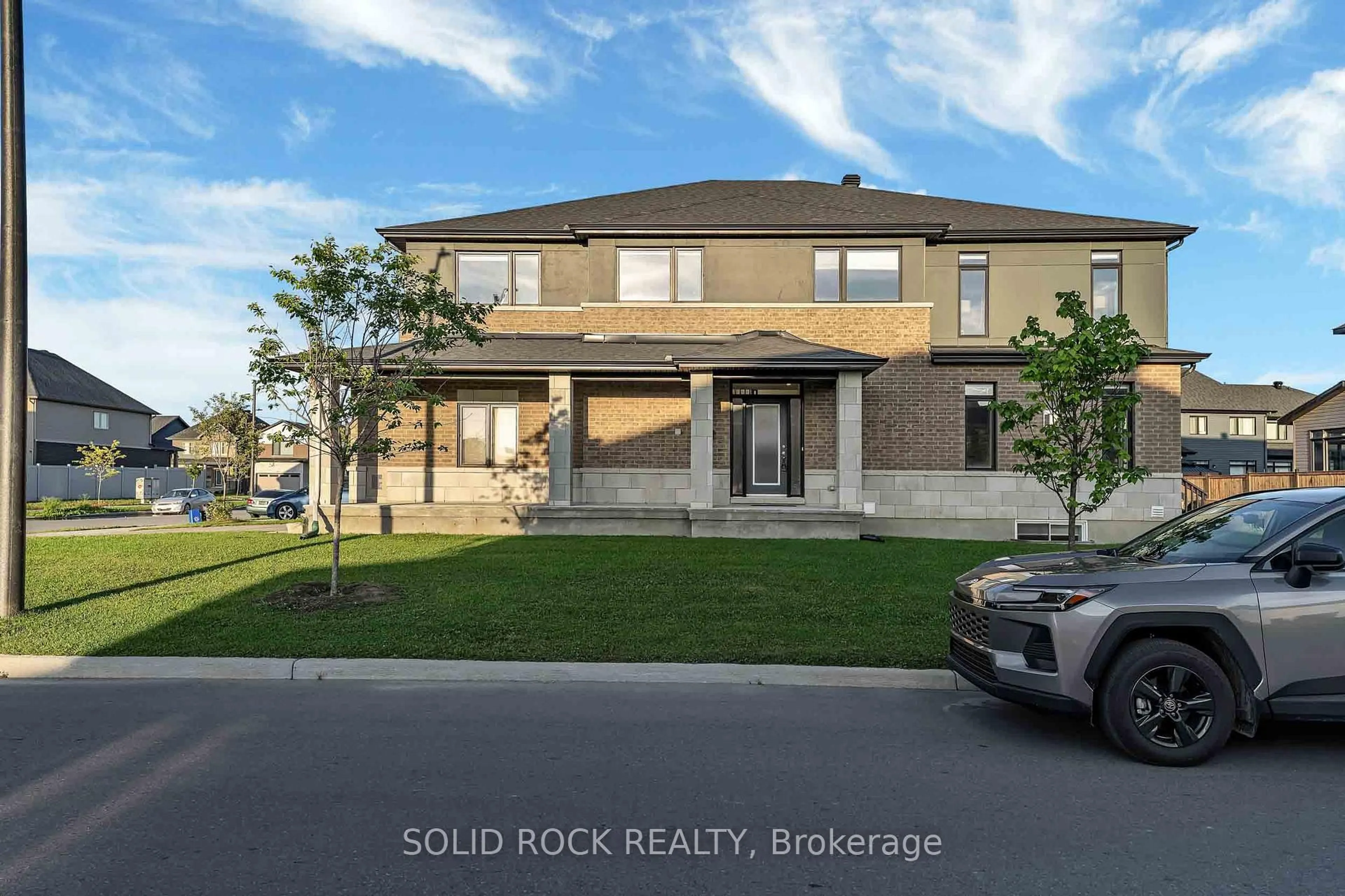 A pic from outside/outdoor area/front of a property/back of a property/a pic from drone, unknown for 859 Solarium Ave, Ottawa Ontario K4M 0H1