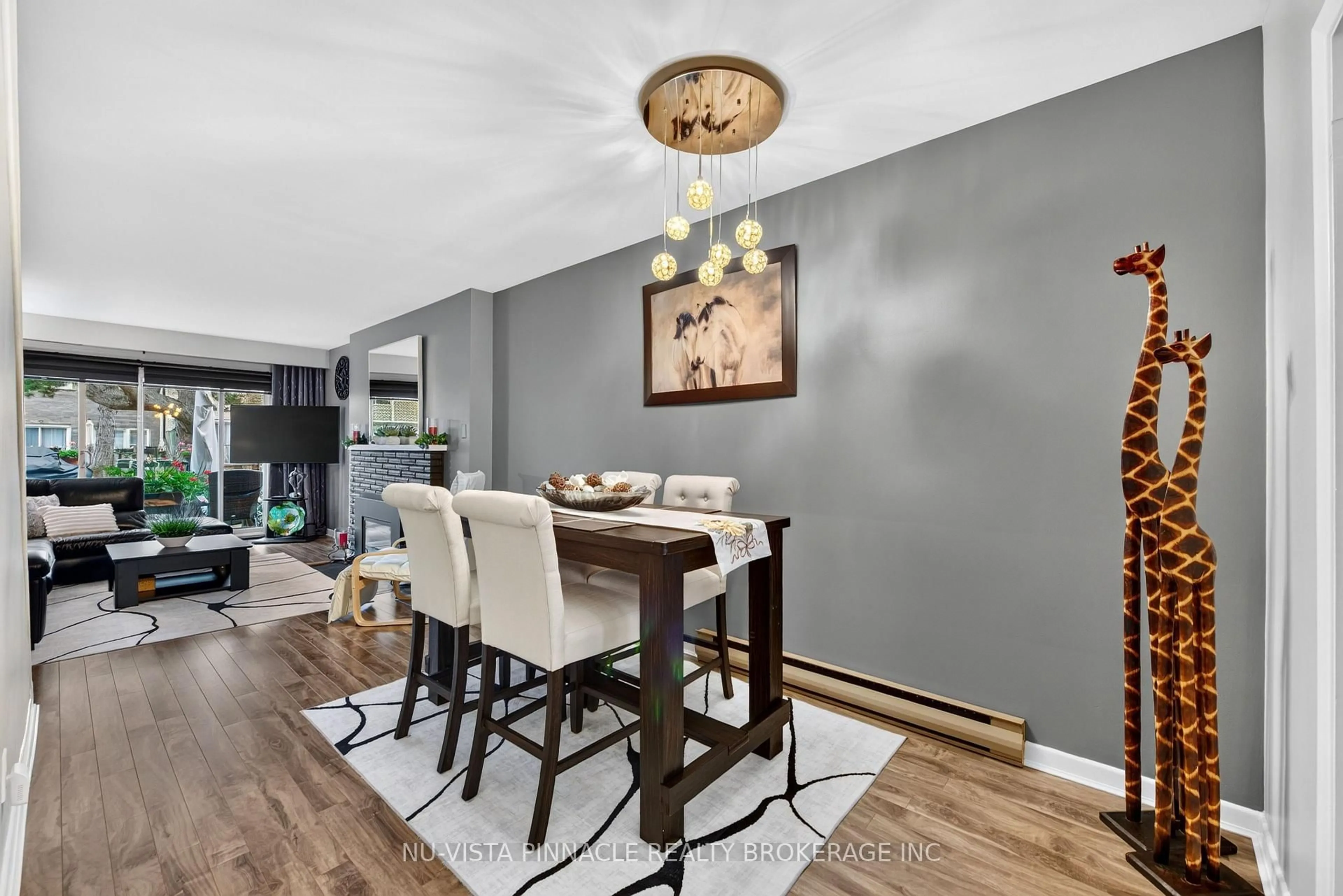 Dining room, wood/laminate floor for 7 Arbour Glen Cres, London East Ontario N5Y 1Z9