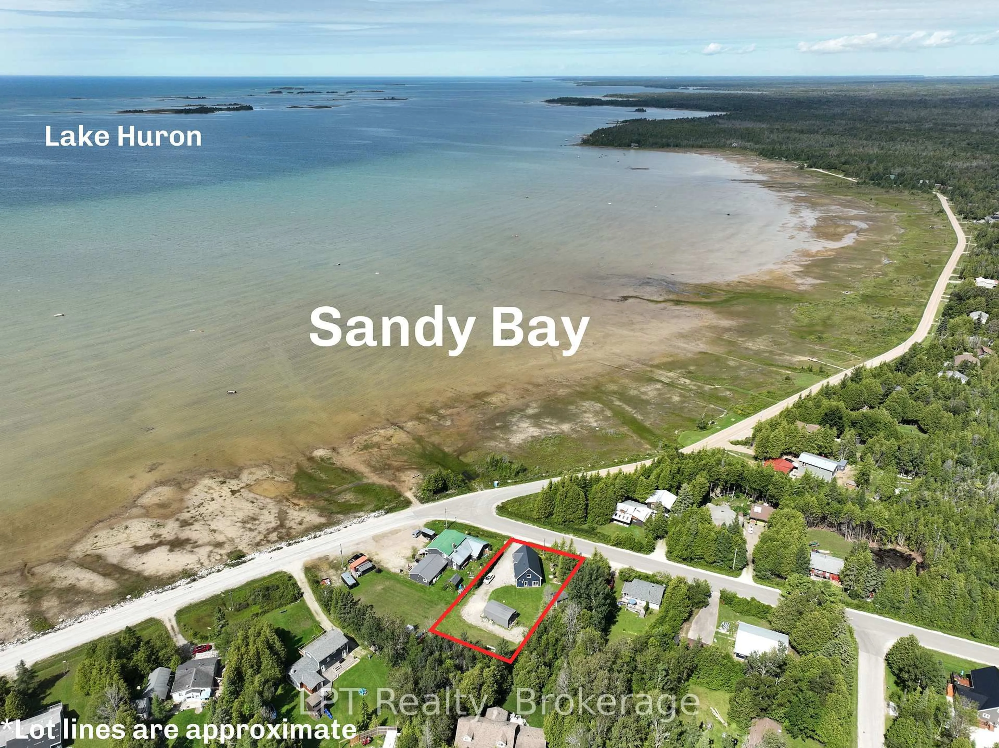 A pic from outside/outdoor area/front of a property/back of a property/a pic from drone, water/lake/river/ocean view for 6 Spry Lake Rd, South Bruce Peninsula Ontario N0H 2T0