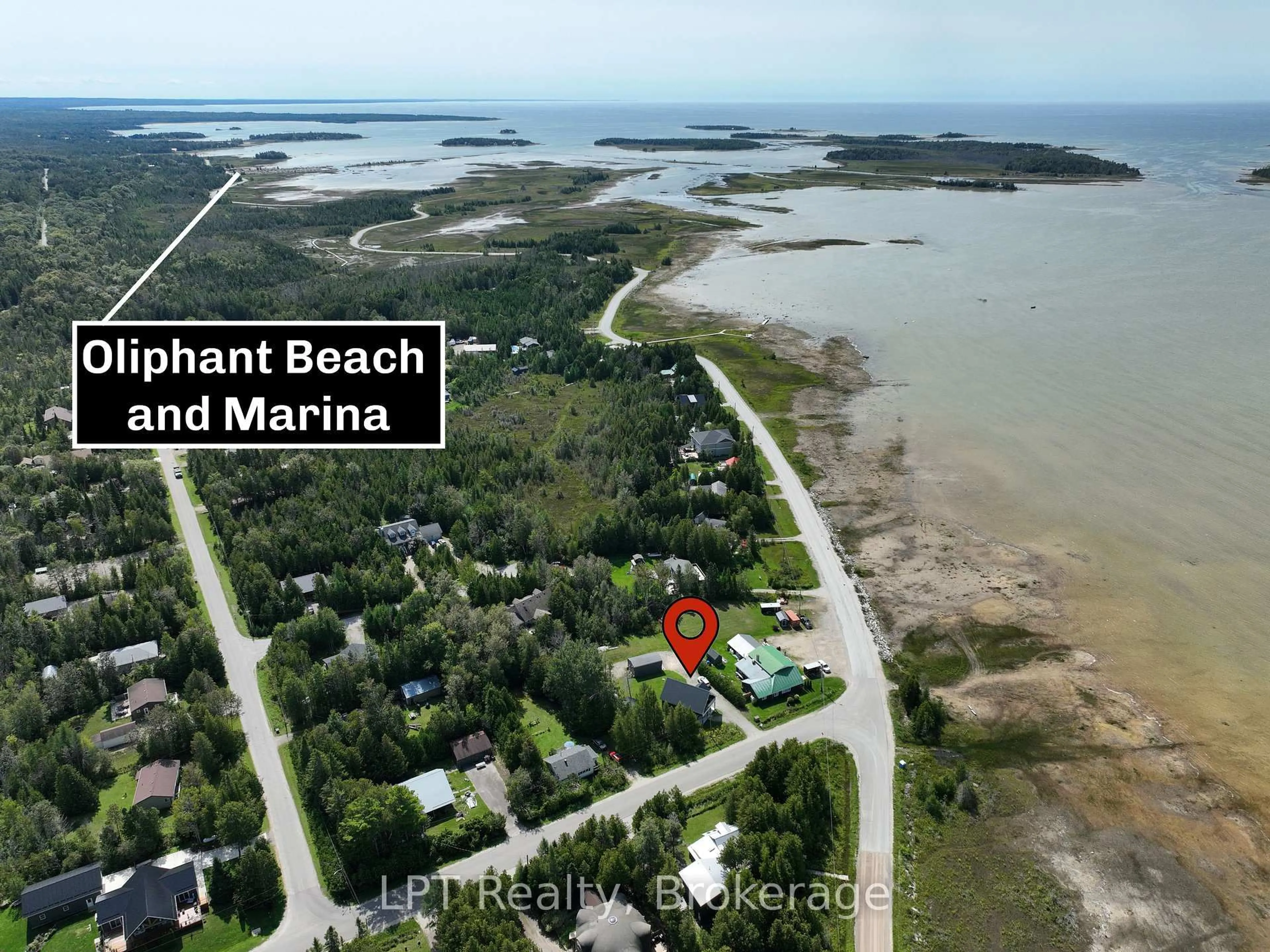 A pic from outside/outdoor area/front of a property/back of a property/a pic from drone, water/lake/river/ocean view for 6 Spry Lake Rd, South Bruce Peninsula Ontario N0H 2T0