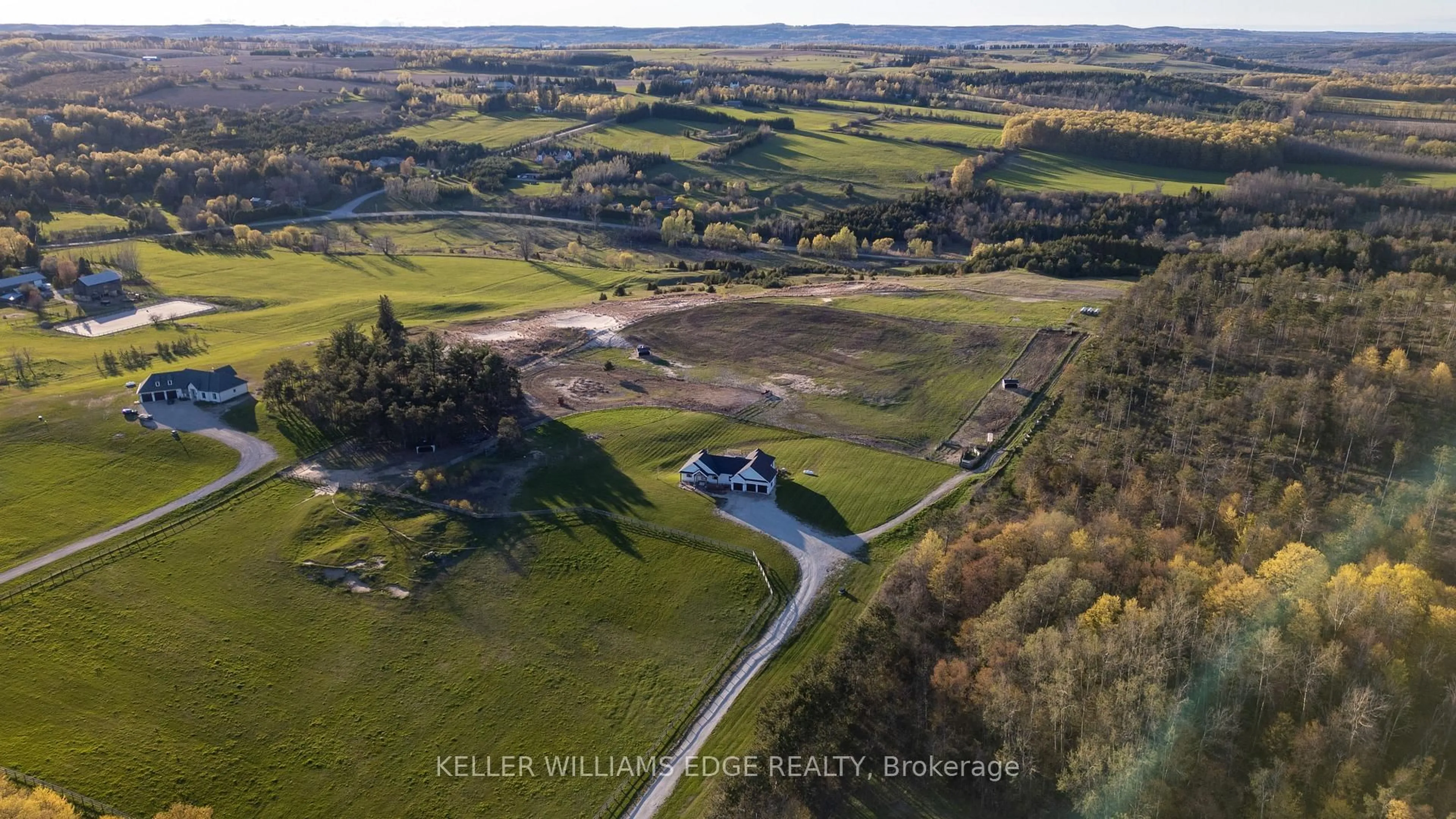 A pic from outside/outdoor area/front of a property/back of a property/a pic from drone, water/lake/river/ocean view for 568211 9 Sdrd, Mulmur Ontario L9V 3S9