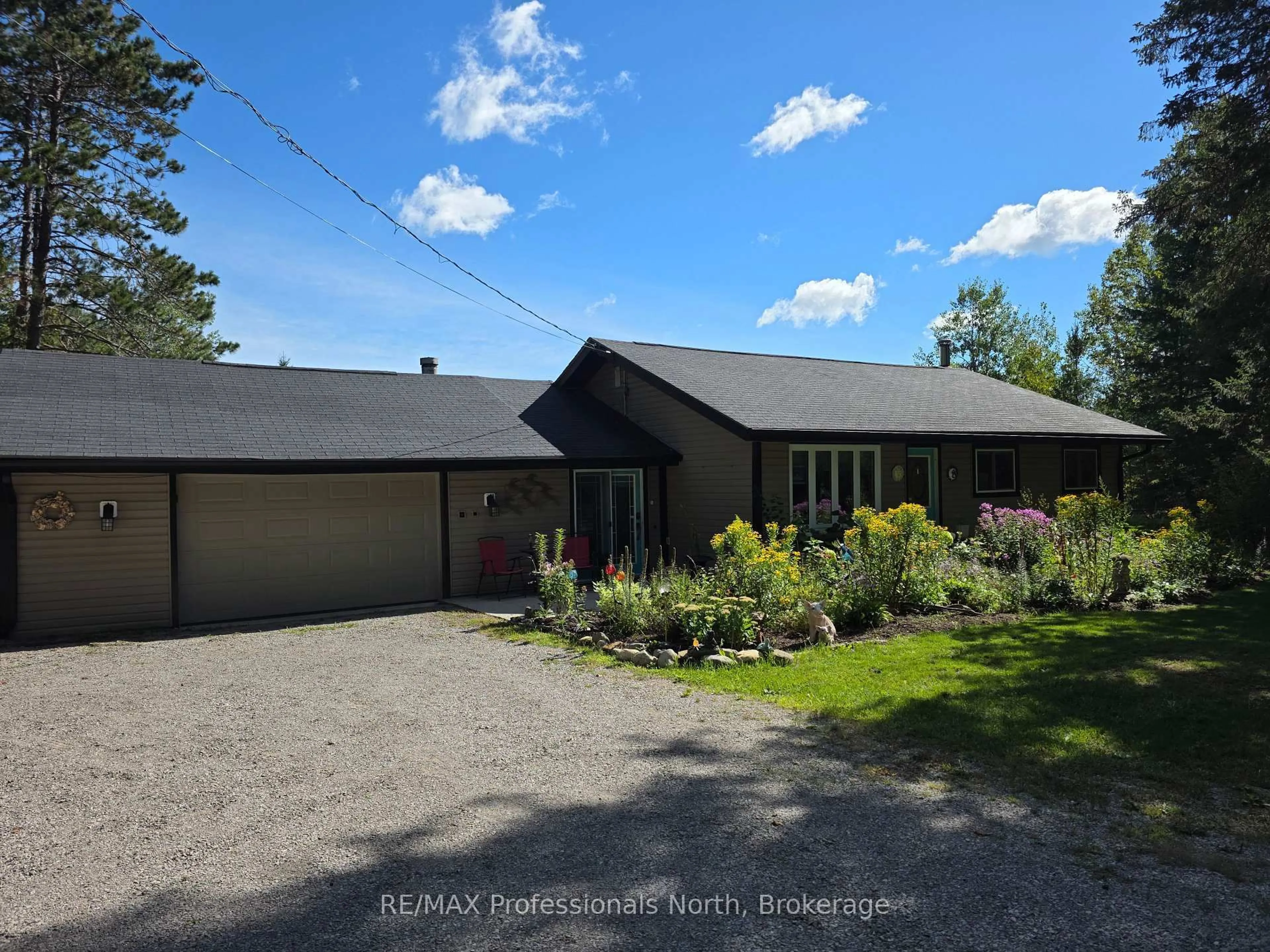 A pic from outside/outdoor area/front of a property/back of a property/a pic from drone, street for 342 Bobcaygeon Rd, Minden Hills Ontario K0M 2K0
