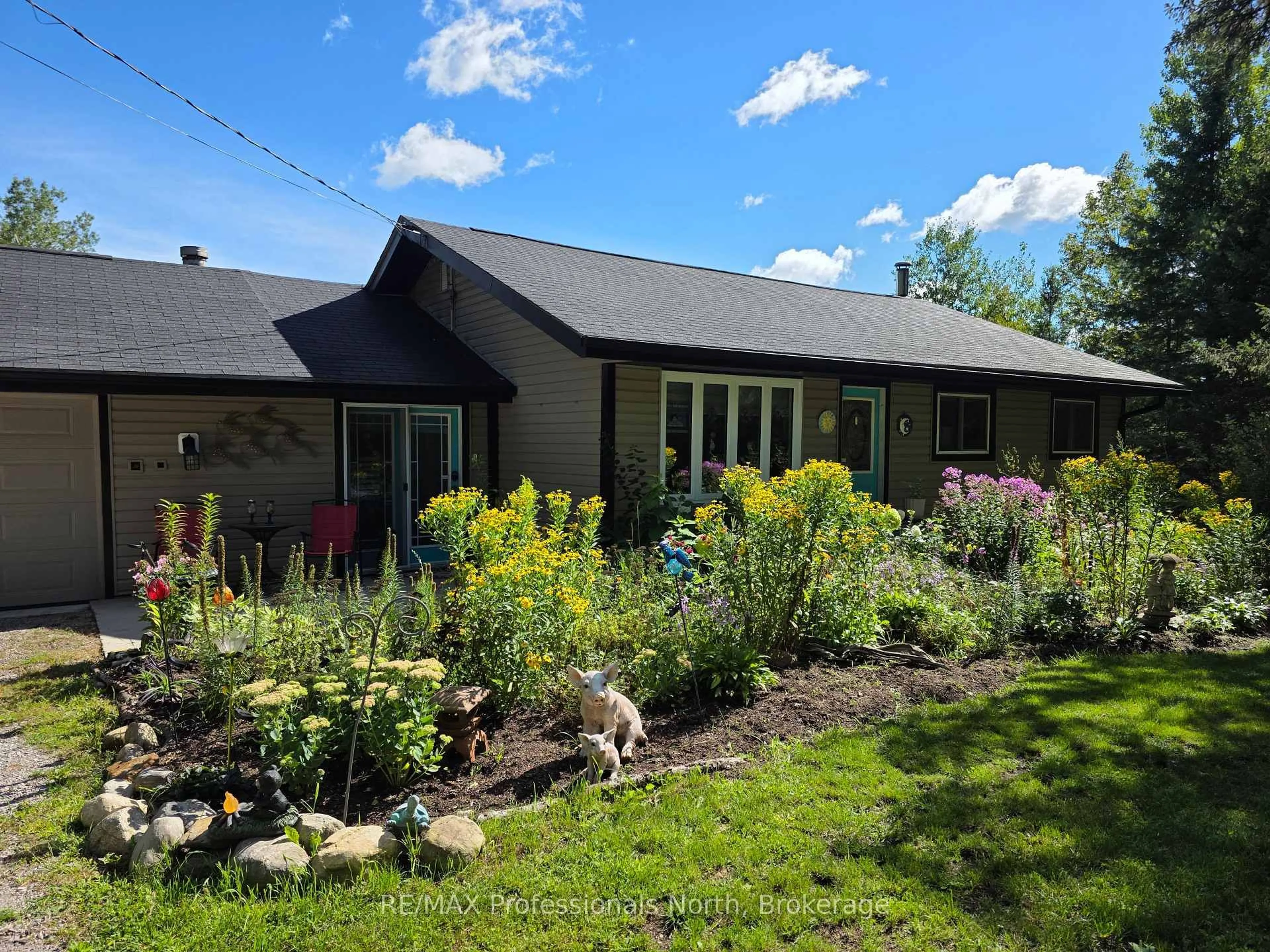 A pic from outside/outdoor area/front of a property/back of a property/a pic from drone, unknown for 342 Bobcaygeon Rd, Minden Hills Ontario K0M 2K0