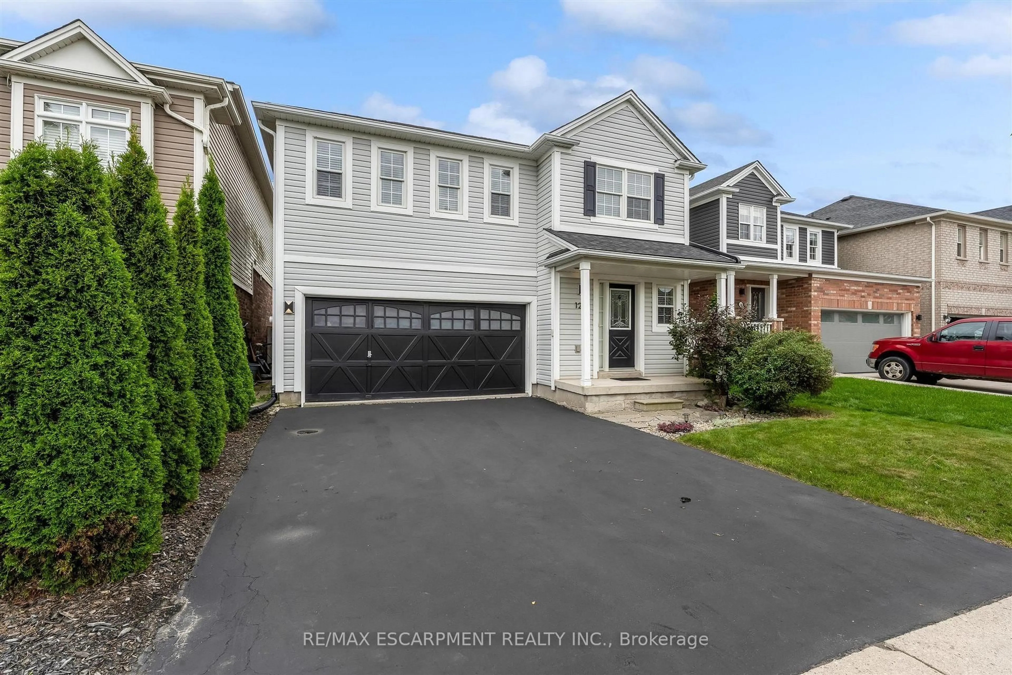 Home with vinyl exterior material, street for 125 Voyager Pass, Hamilton Ontario L0R 1C0