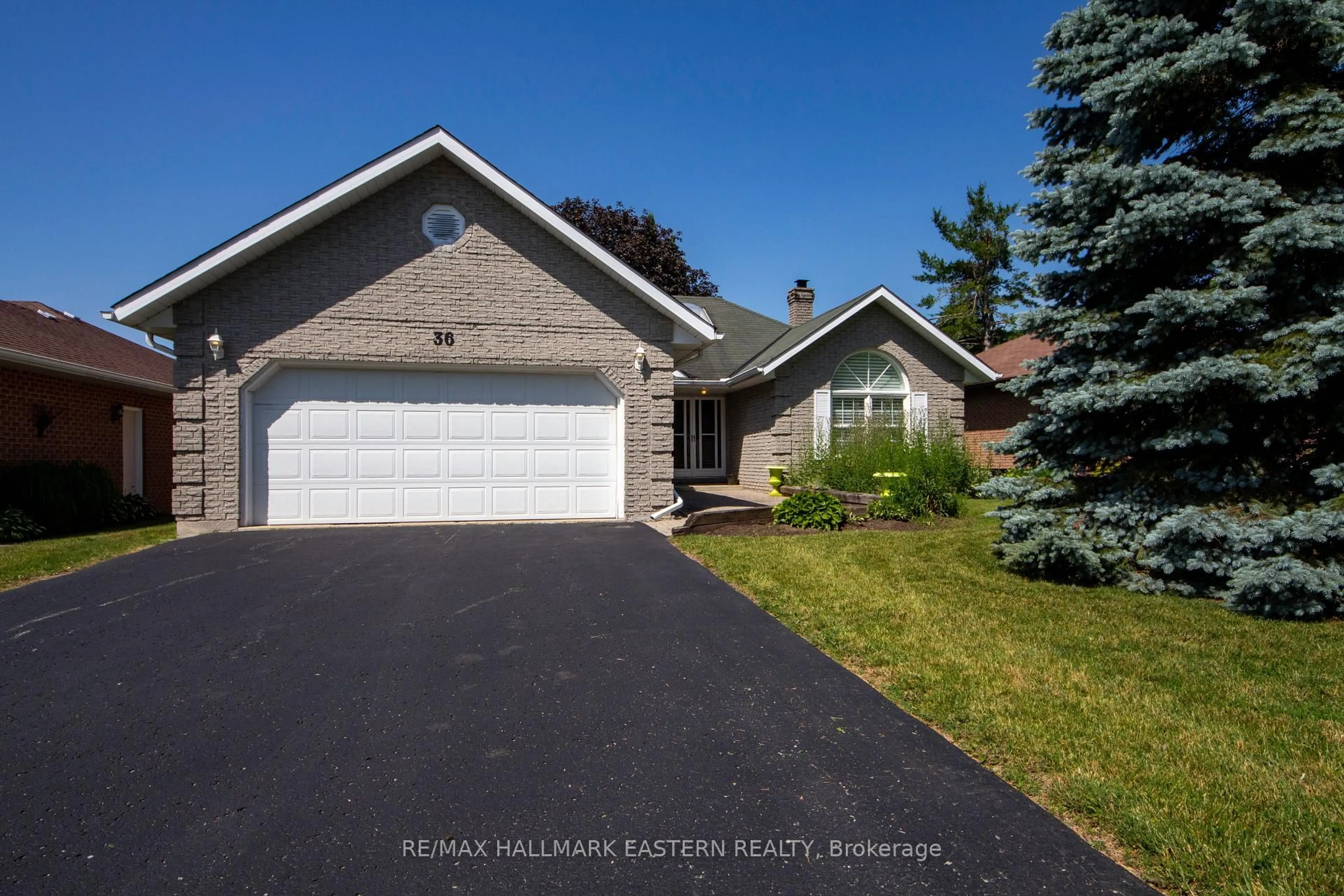 Home with vinyl exterior material, street for 36 Russell Hill Rd, Kawartha Lakes Ontario K0M 1A0