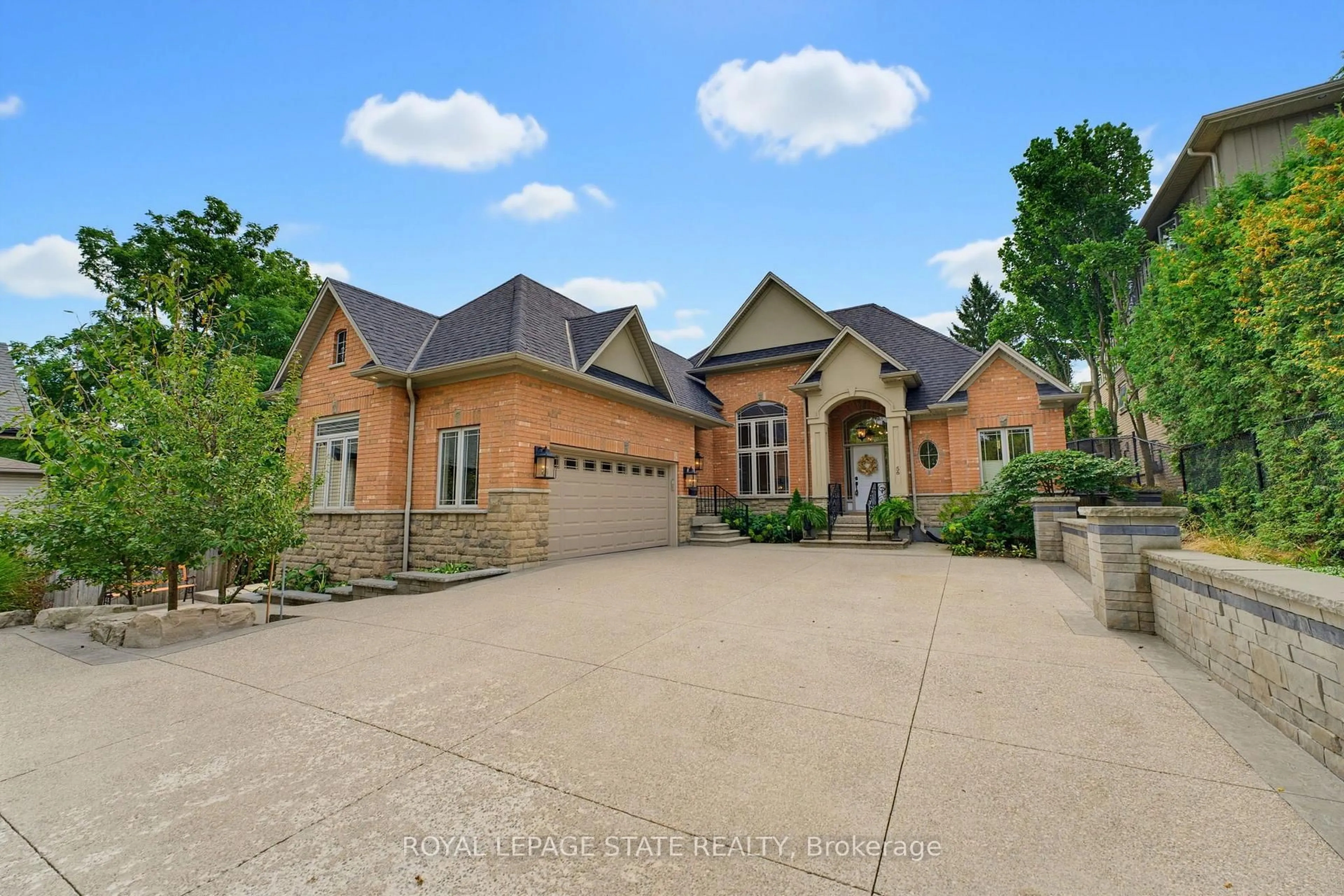 Home with brick exterior material, street for 56 Academy St, Hamilton Ontario L9G 2Y1