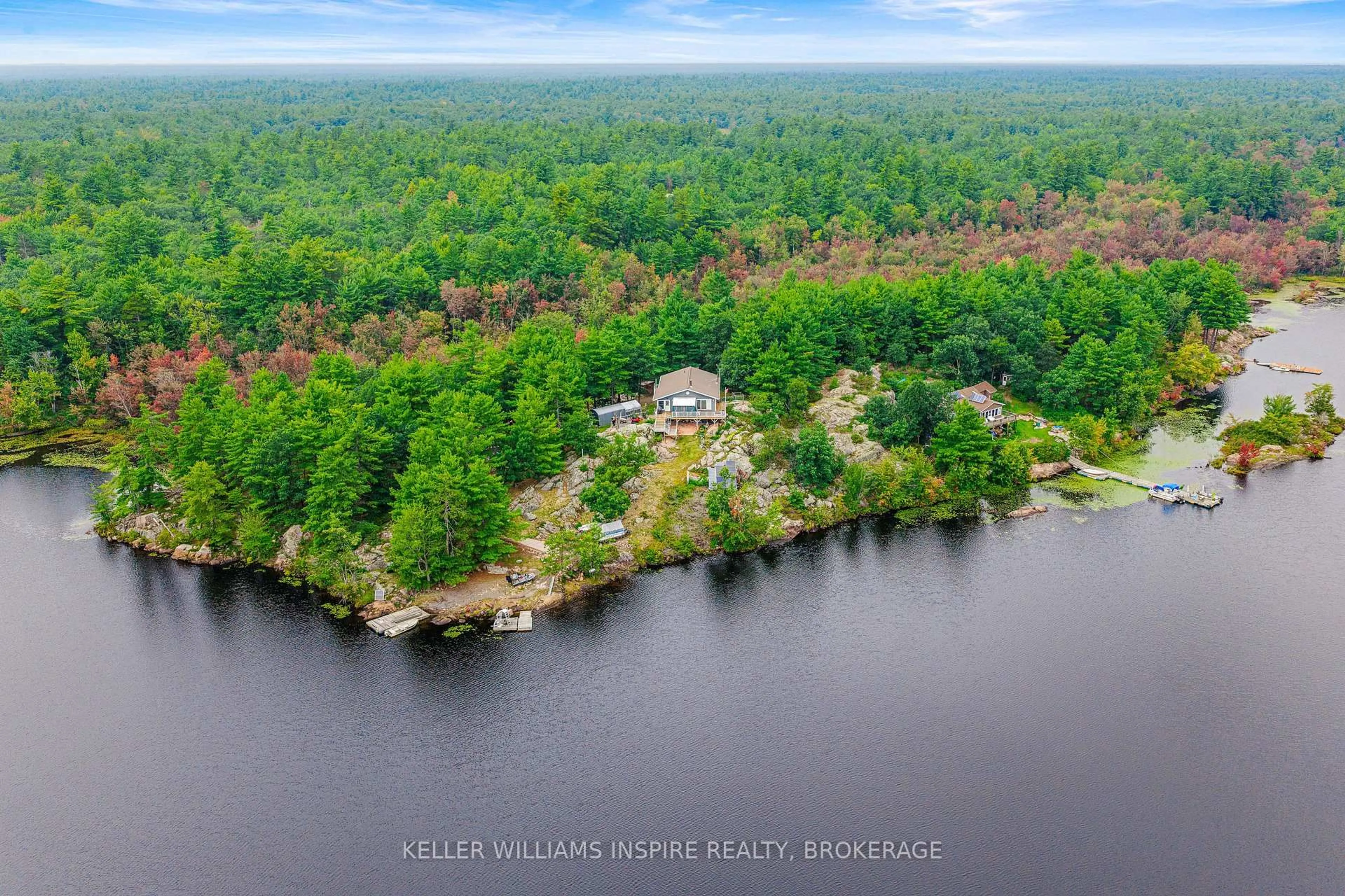 A pic from outside/outdoor area/front of a property/back of a property/a pic from drone, water/lake/river/ocean view for 2526 Sheffield Long Lake, Stone Mills Ontario K0K 1W0
