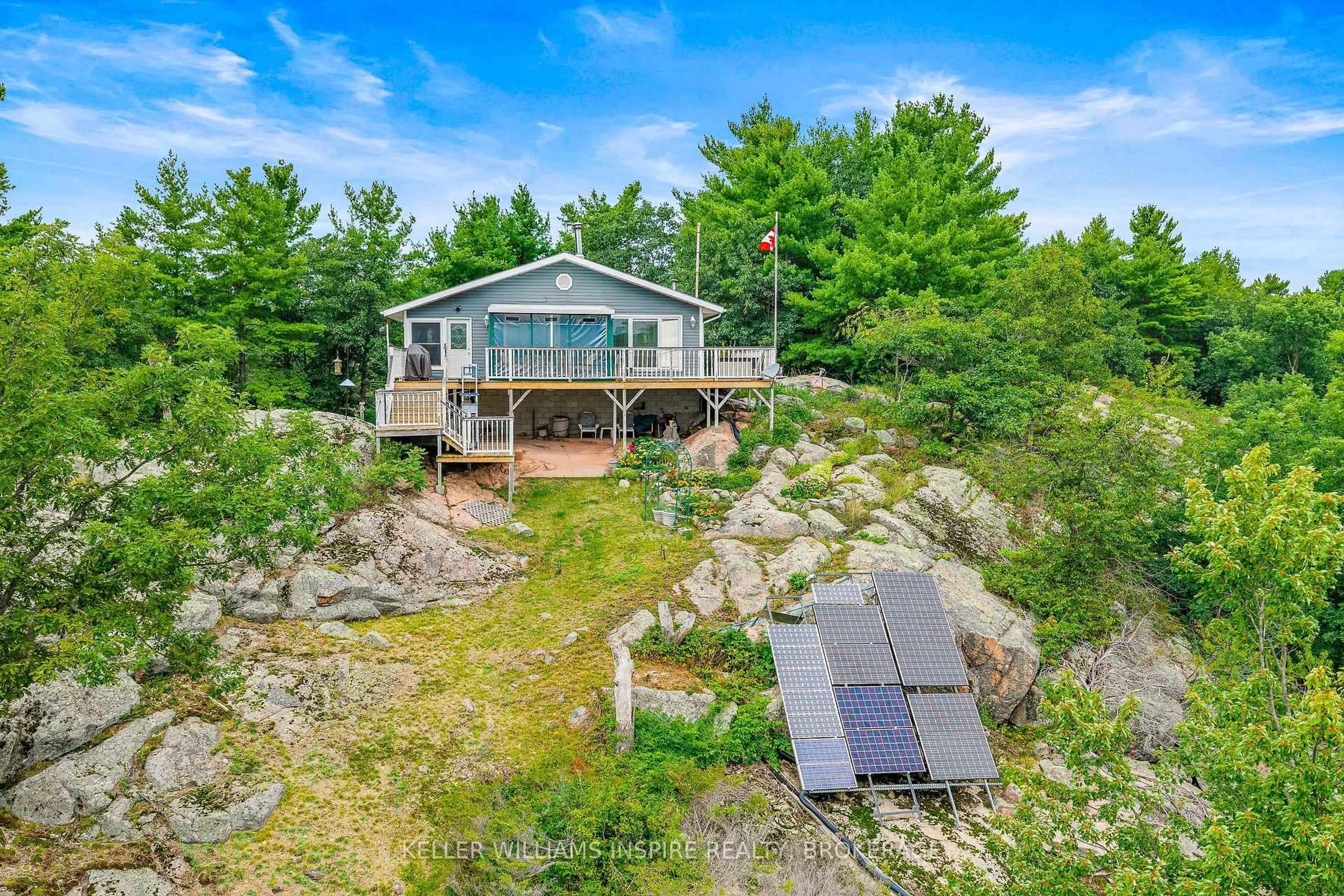 A pic from outside/outdoor area/front of a property/back of a property/a pic from drone, water/lake/river/ocean view for 2526 Sheffield Long Lake, Stone Mills Ontario K0K 1W0