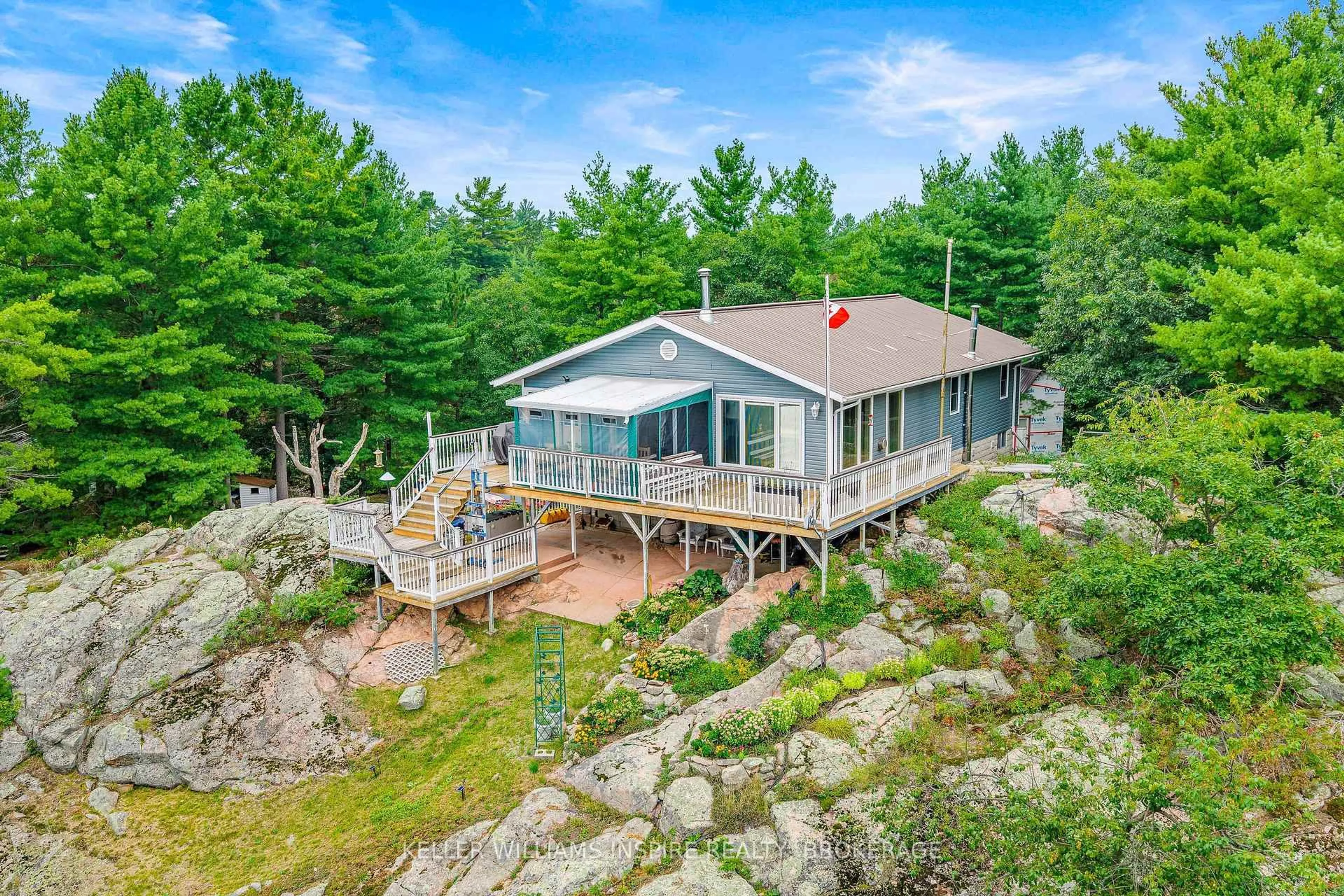 A pic from outside/outdoor area/front of a property/back of a property/a pic from drone, water/lake/river/ocean view for 2526 Sheffield Long Lake, Stone Mills Ontario K0K 1W0