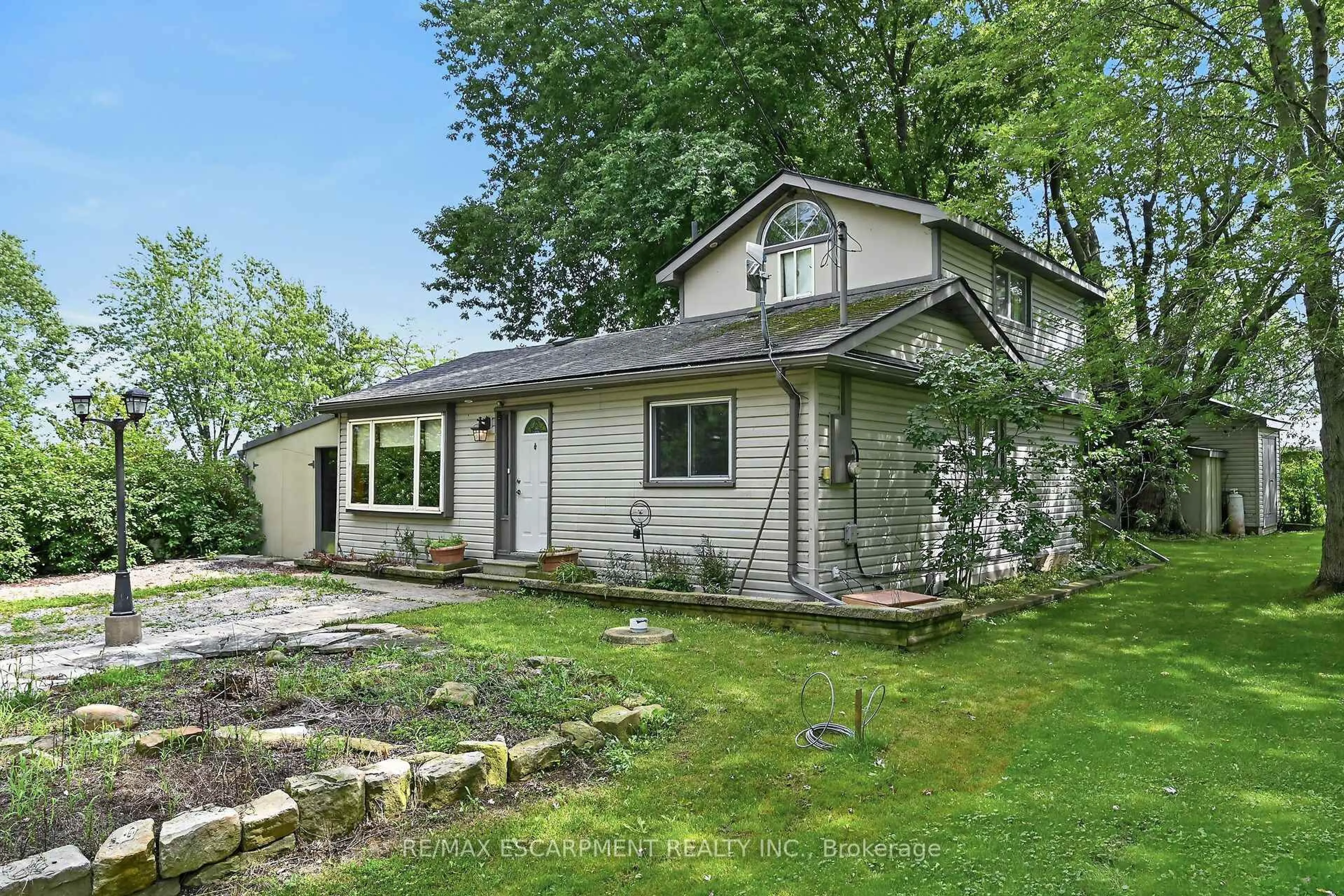 Home with vinyl exterior material, street for 64 Windy Line, Haldimand Ontario N0A 1K0