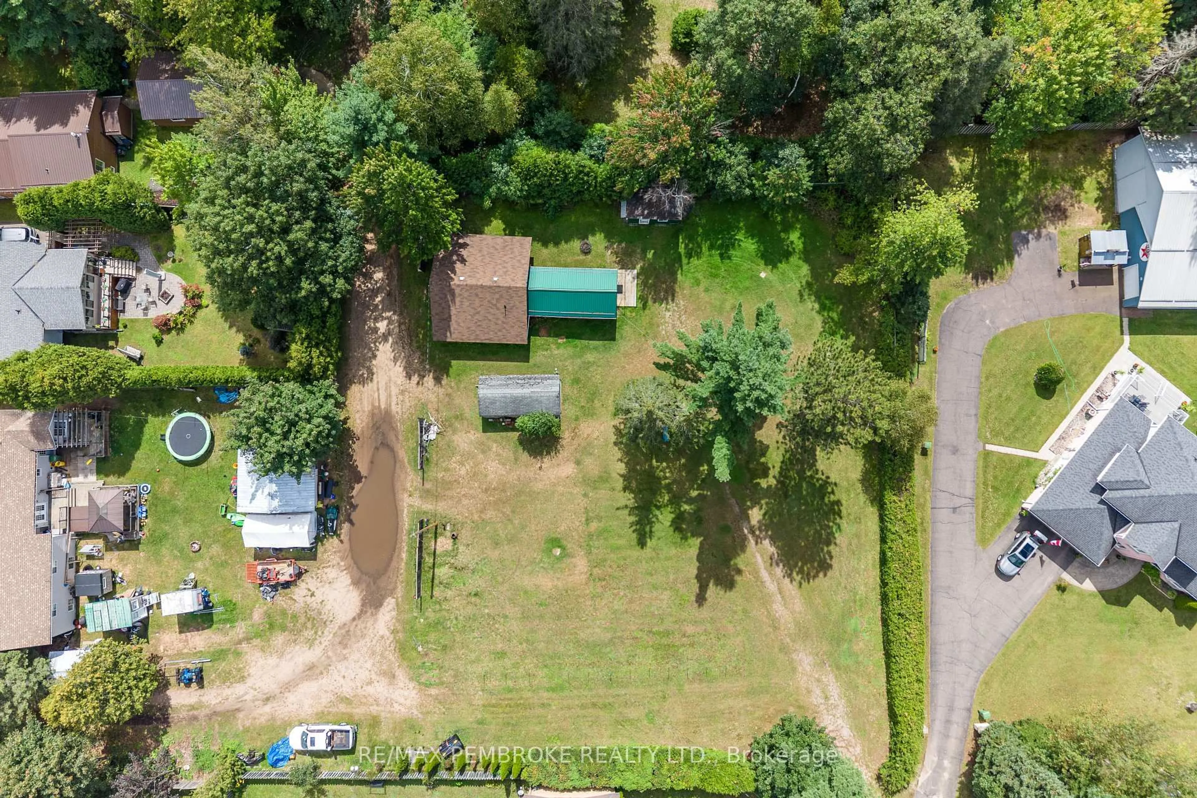 A pic from outside/outdoor area/front of a property/back of a property/a pic from drone, forest/trees view for 1469 Victoria St, Petawawa Ontario K8H 2G2