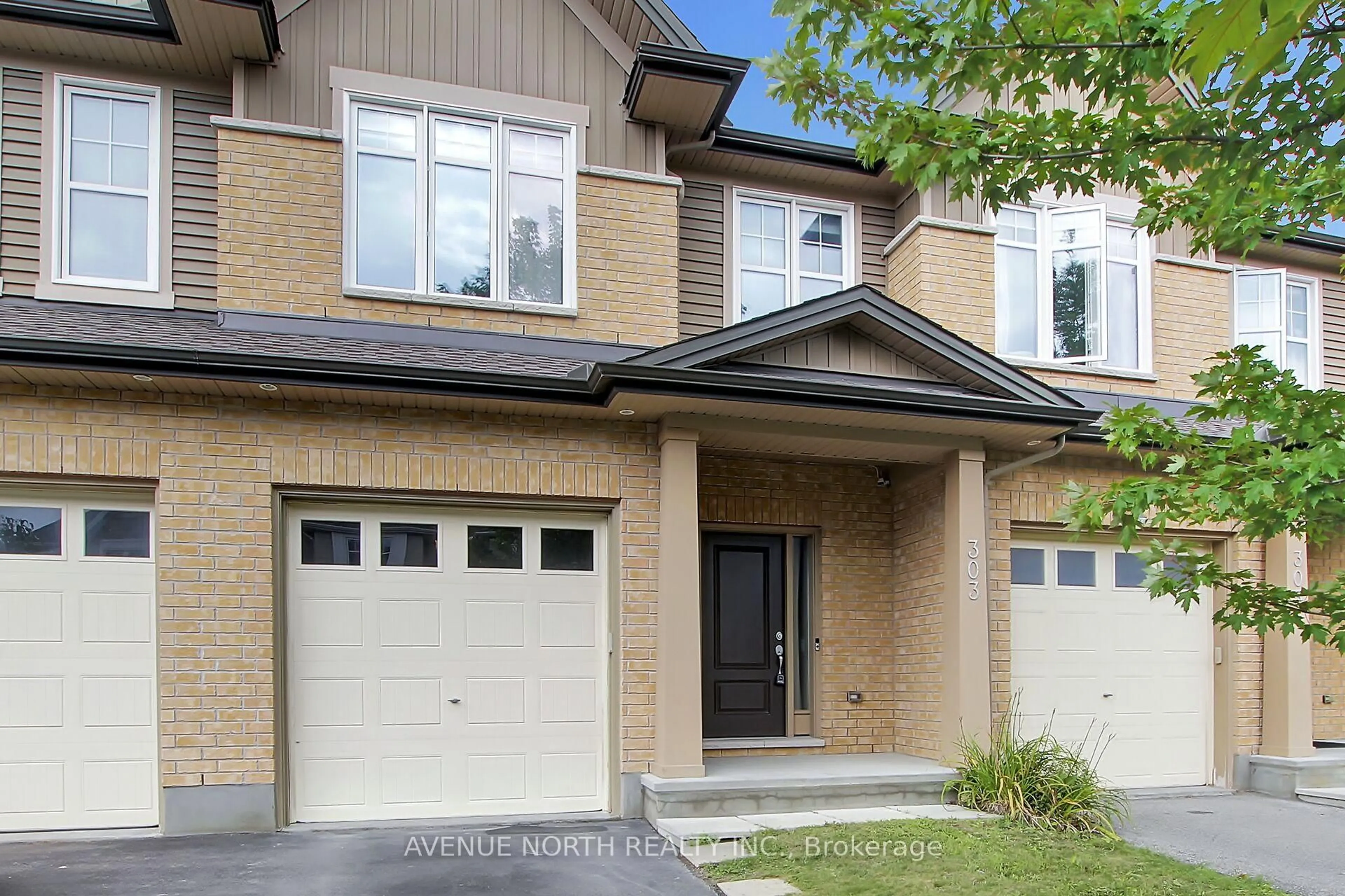 Home with brick exterior material, street for 303 Wood Acres Grve, Ottawa Ontario K1T 0M5
