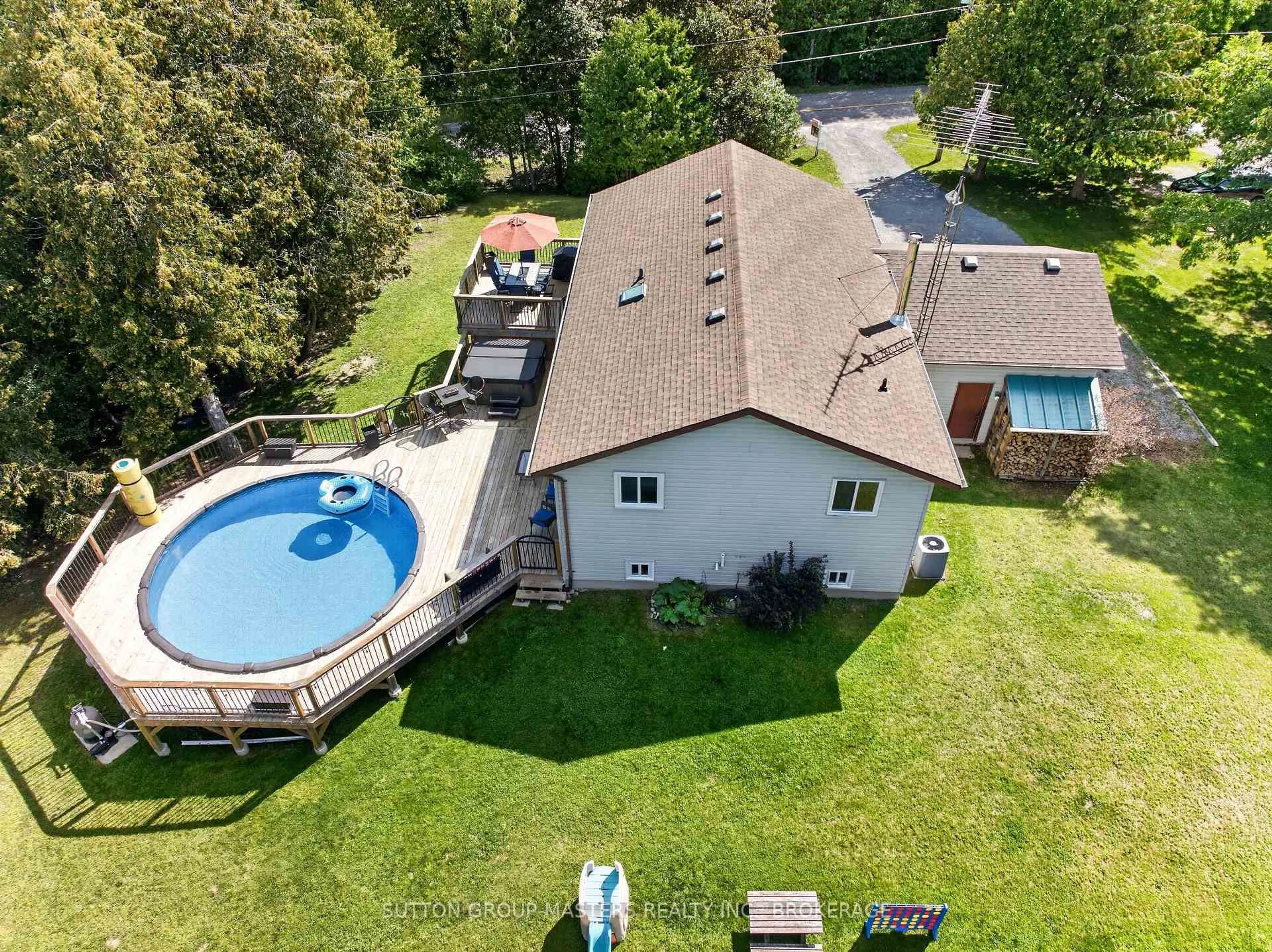 A pic from outside/outdoor area/front of a property/back of a property/a pic from drone, water/lake/river/ocean view for 4393 Wolfe Swamp Rd, Harrowsmith Ontario K0H 1V0