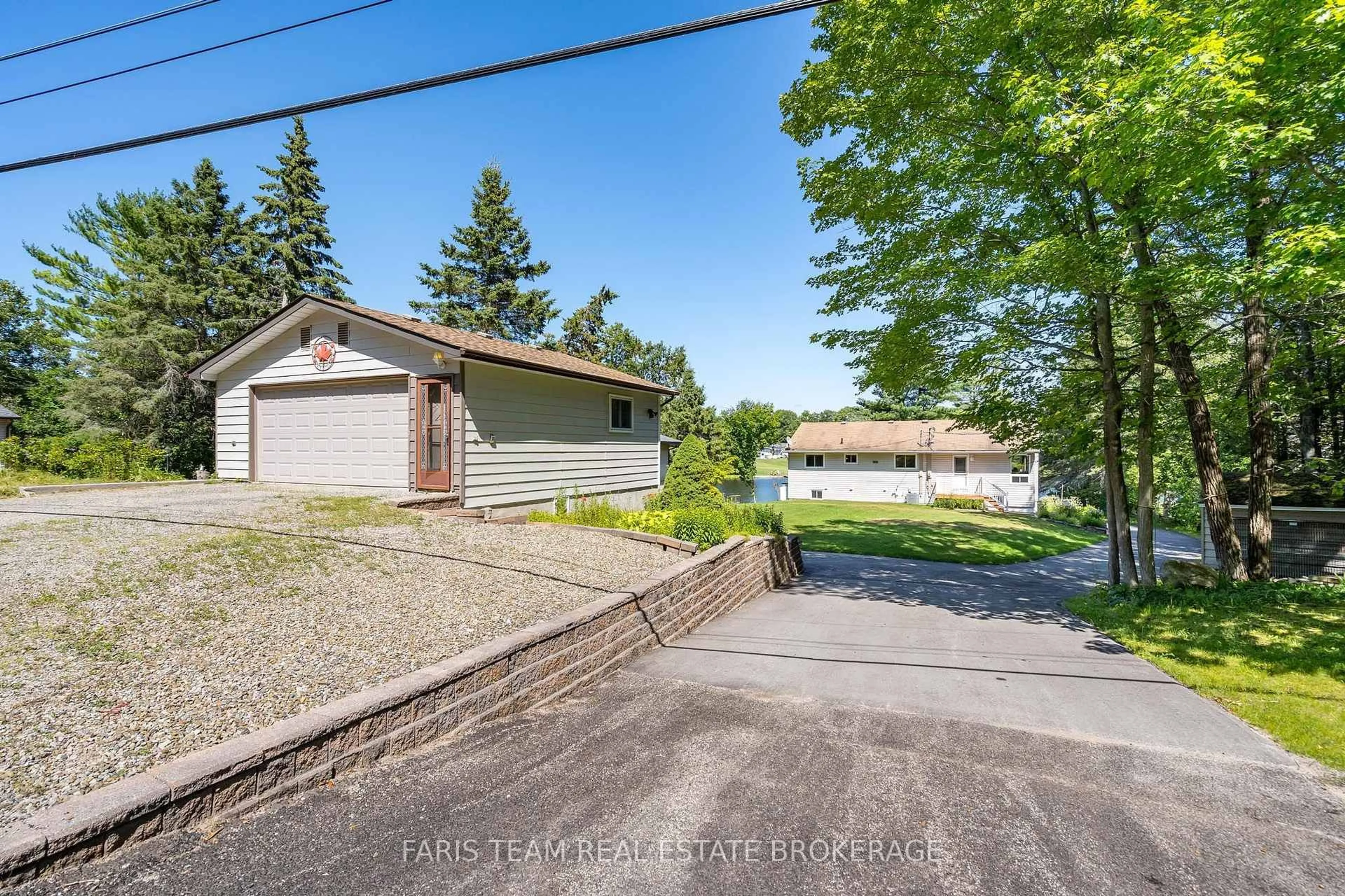 A pic from outside/outdoor area/front of a property/back of a property/a pic from drone, street for 48 Heath Valley Tr, Georgian Bay Ontario L0K 1S0