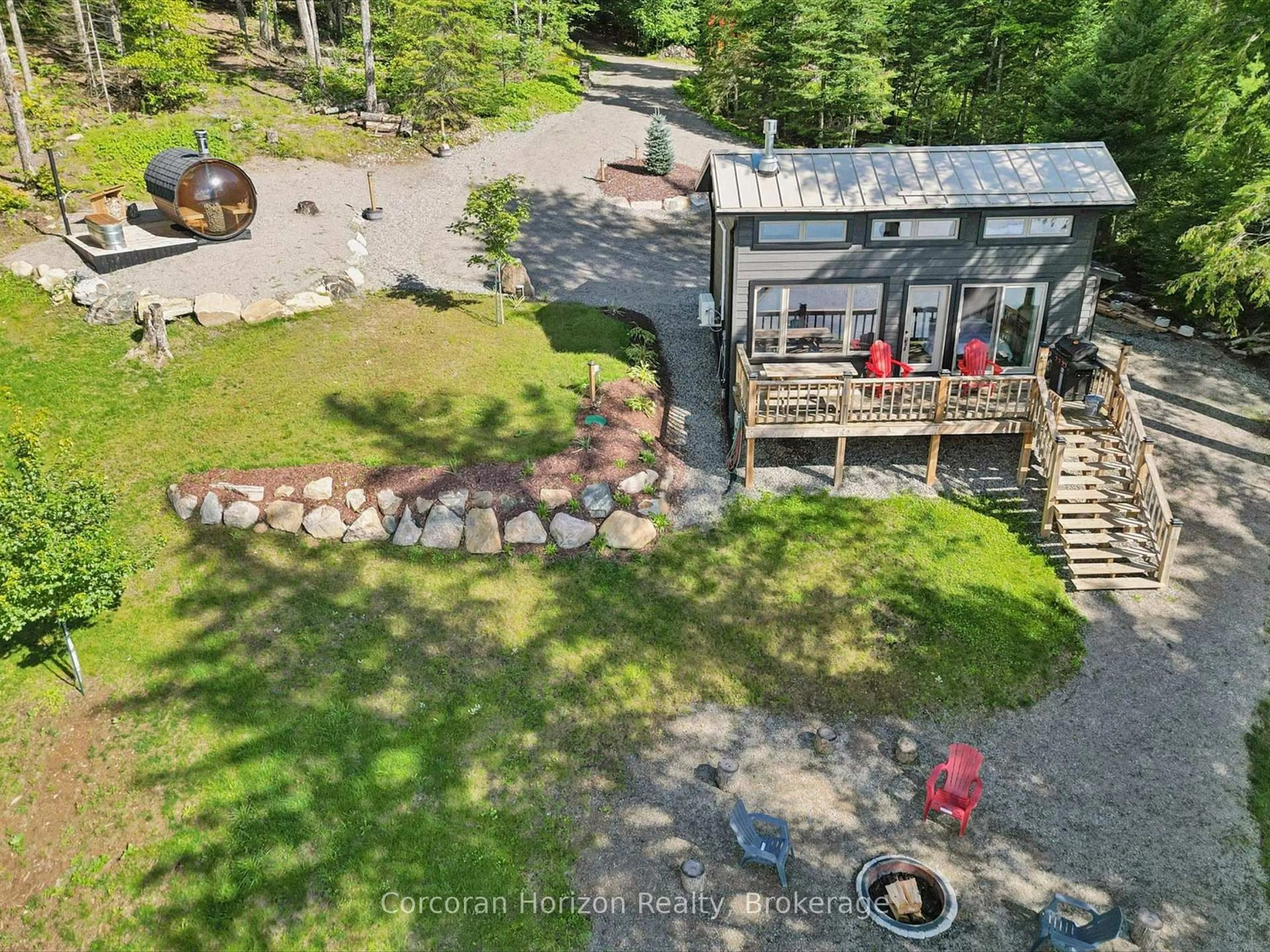 A pic from outside/outdoor area/front of a property/back of a property/a pic from drone, unknown for 1211 Pluto Tr, Dysart et al Ontario K0M 1S0