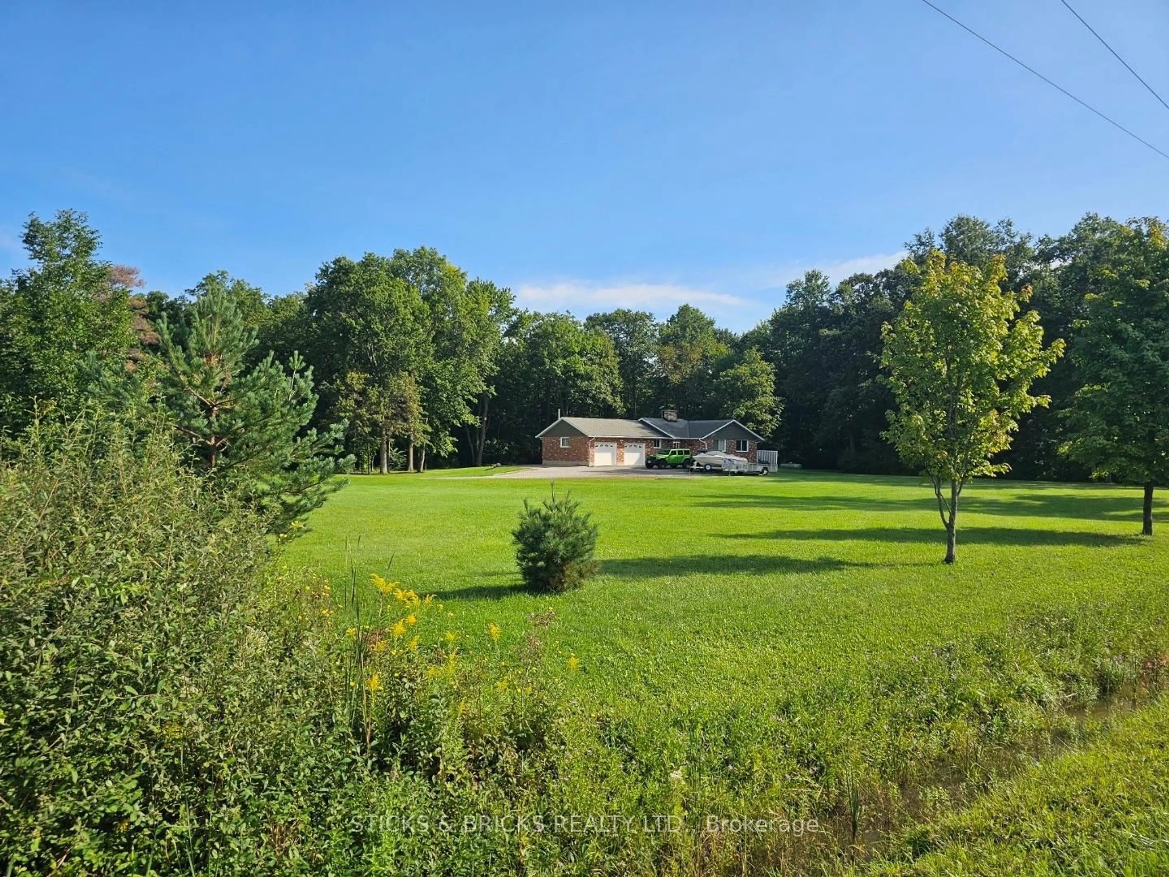 A pic from outside/outdoor area/front of a property/back of a property/a pic from drone, forest/trees view for 9195 Carl Rd, Niagara Falls Ontario L3B 5N4
