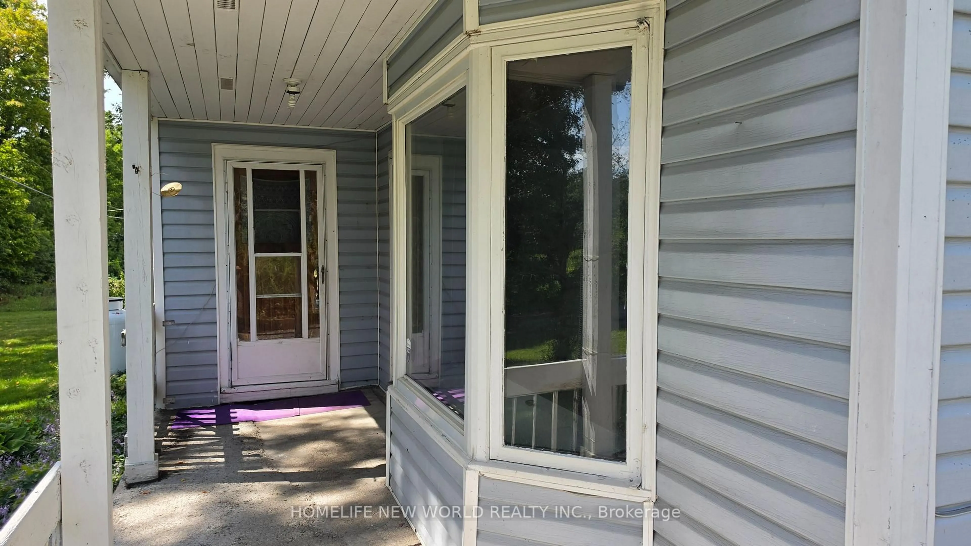 Home with vinyl exterior material, street for 814 THOMASBURG Rd, Madoc Ontario K0K 2K0