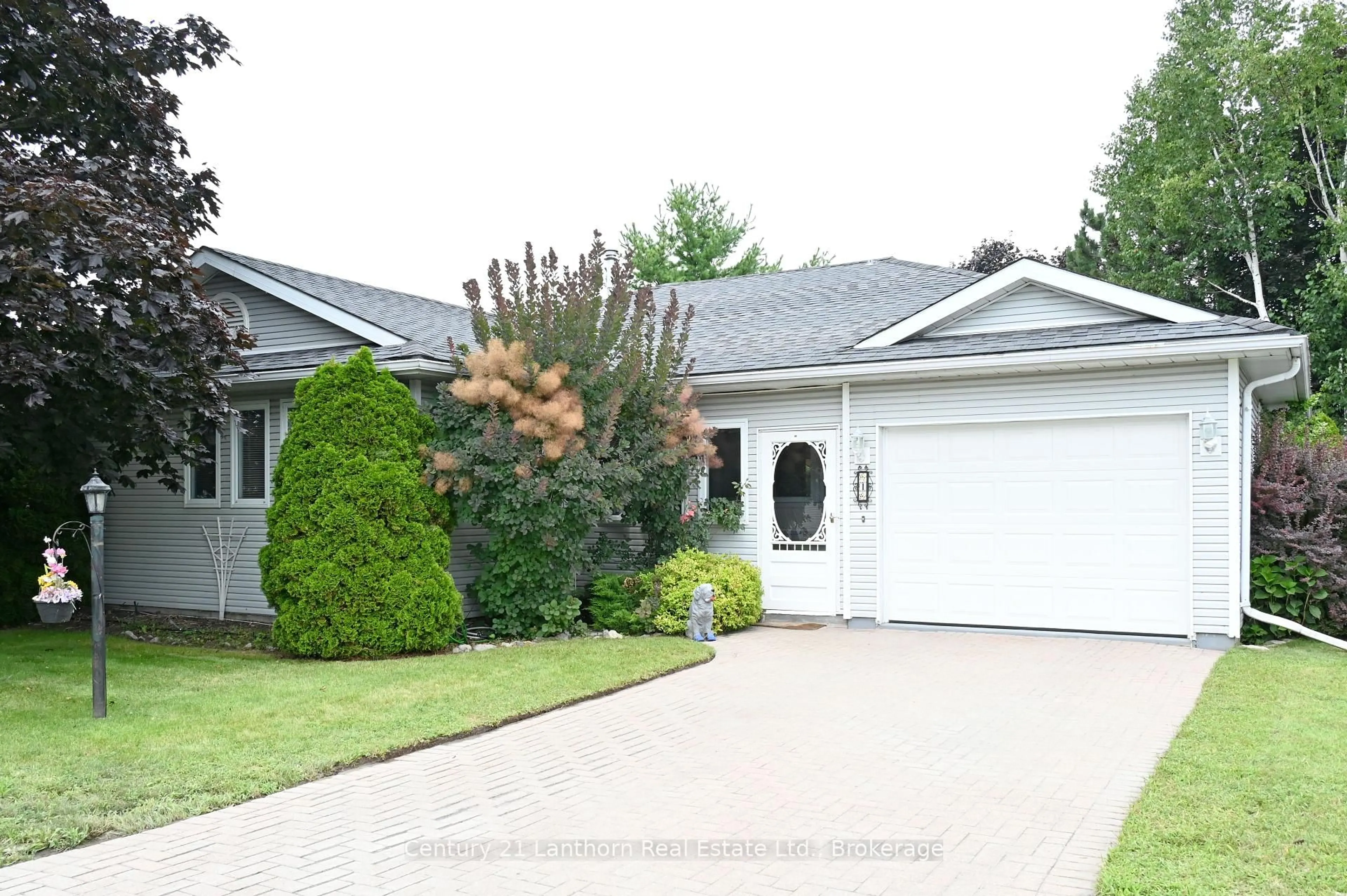 Home with vinyl exterior material, street for 1 Reynolds Pl, Prince Edward County Ontario K0K 3L0