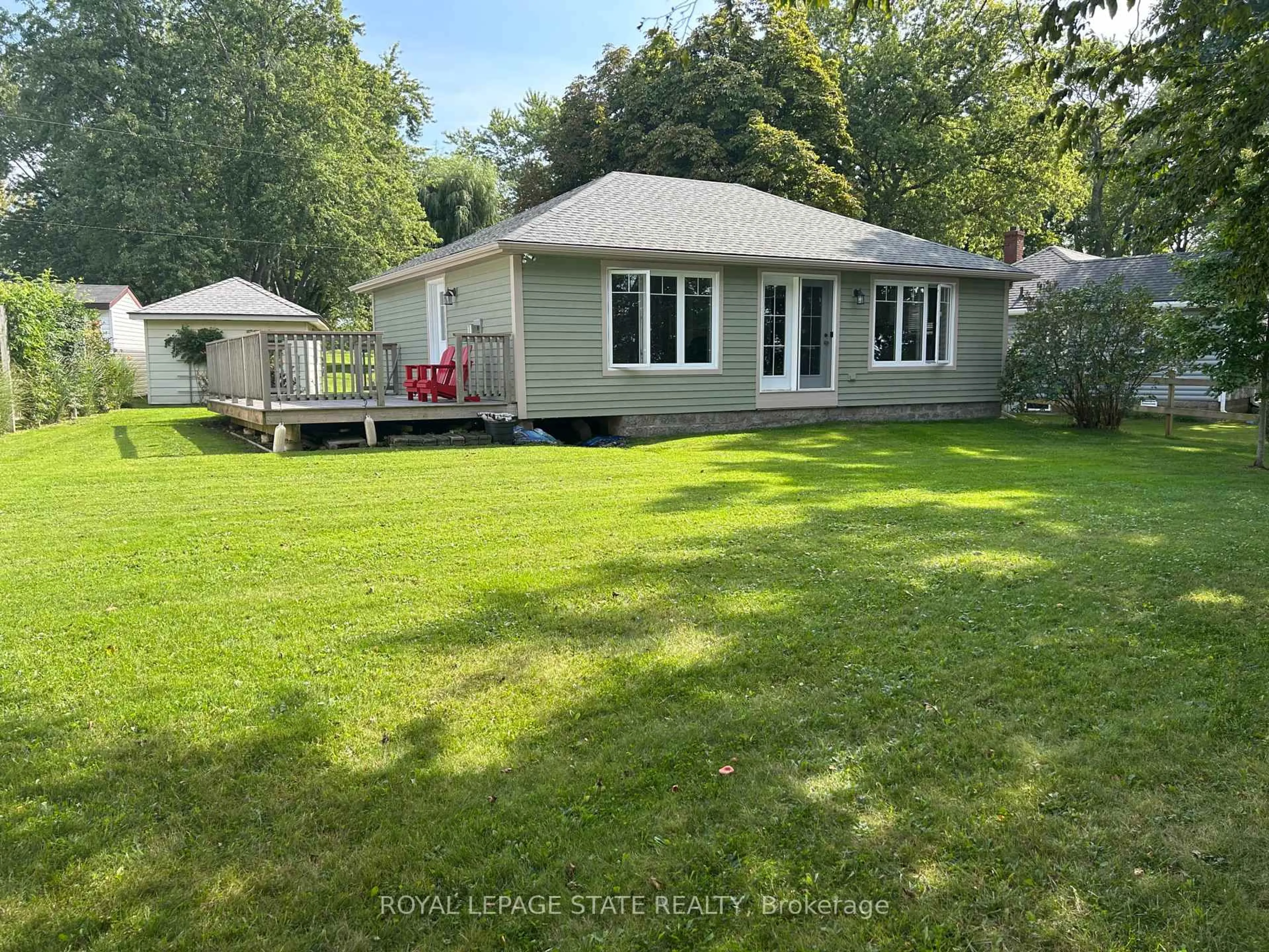 A pic from outside/outdoor area/front of a property/back of a property/a pic from drone, water/lake/river/ocean view for 23 Upper Mohawk Pt, Haldimand Ontario N0A 1K0