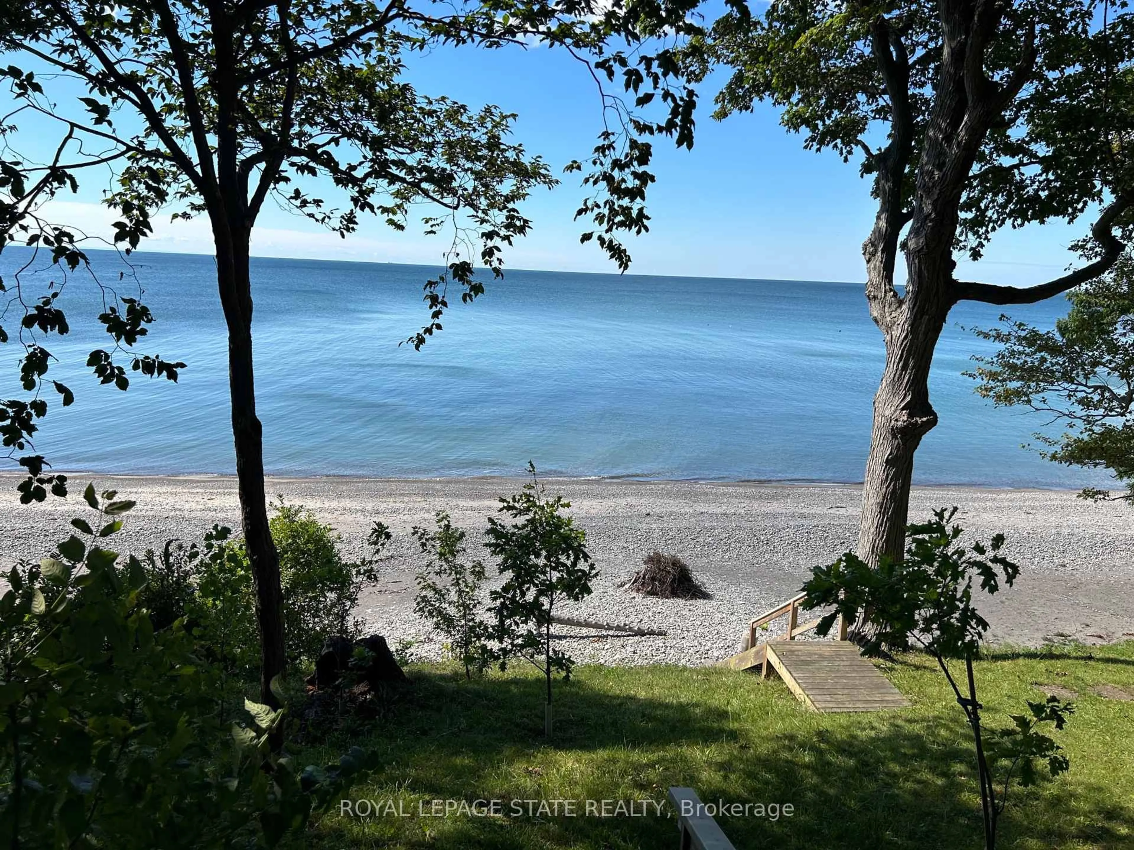 A pic from outside/outdoor area/front of a property/back of a property/a pic from drone, water/lake/river/ocean view for 23 Upper Mohawk Pt, Haldimand Ontario N0A 1K0