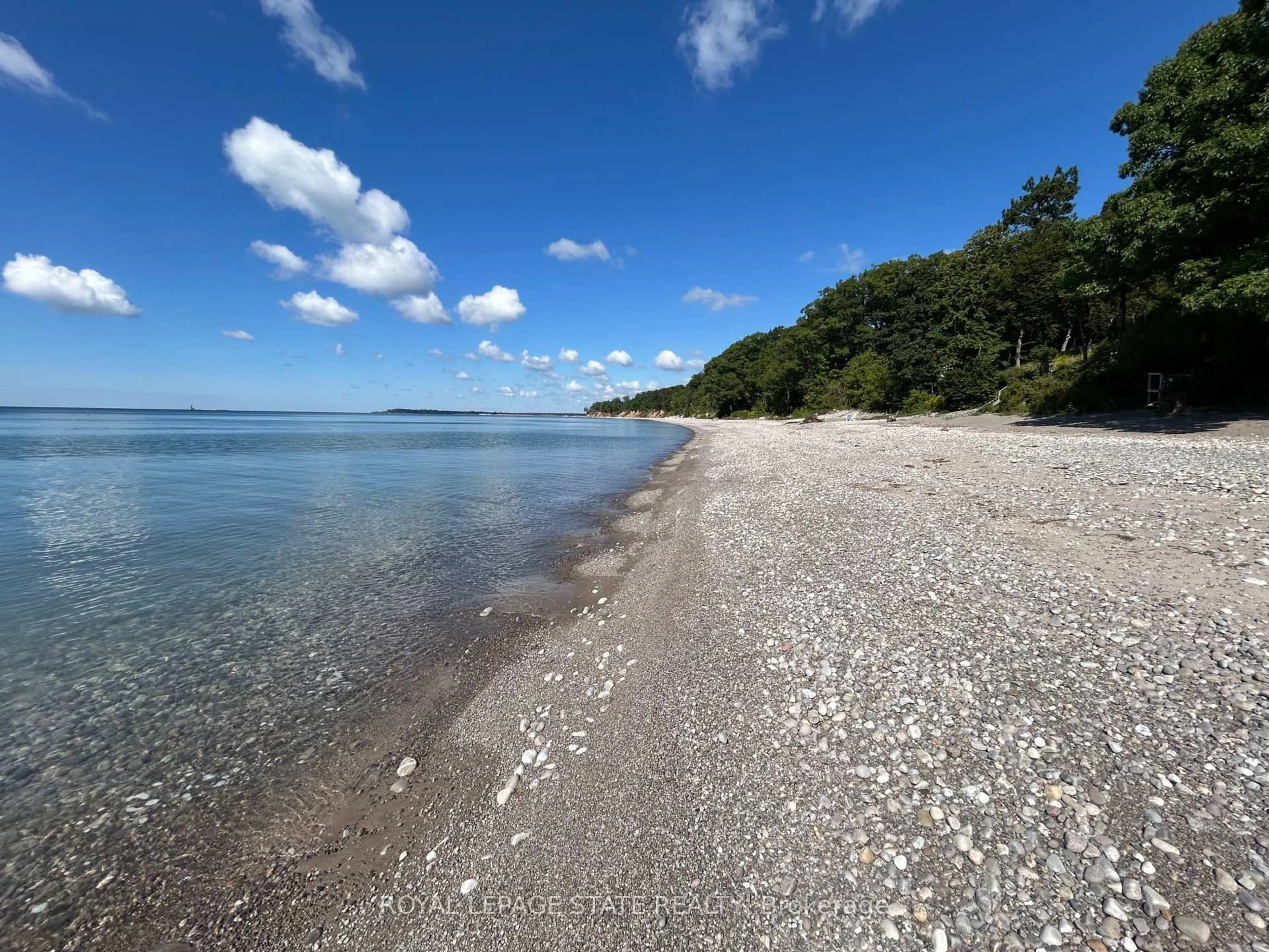 A pic from outside/outdoor area/front of a property/back of a property/a pic from drone, water/lake/river/ocean view for 23 Upper Mohawk Pt, Haldimand Ontario N0A 1K0