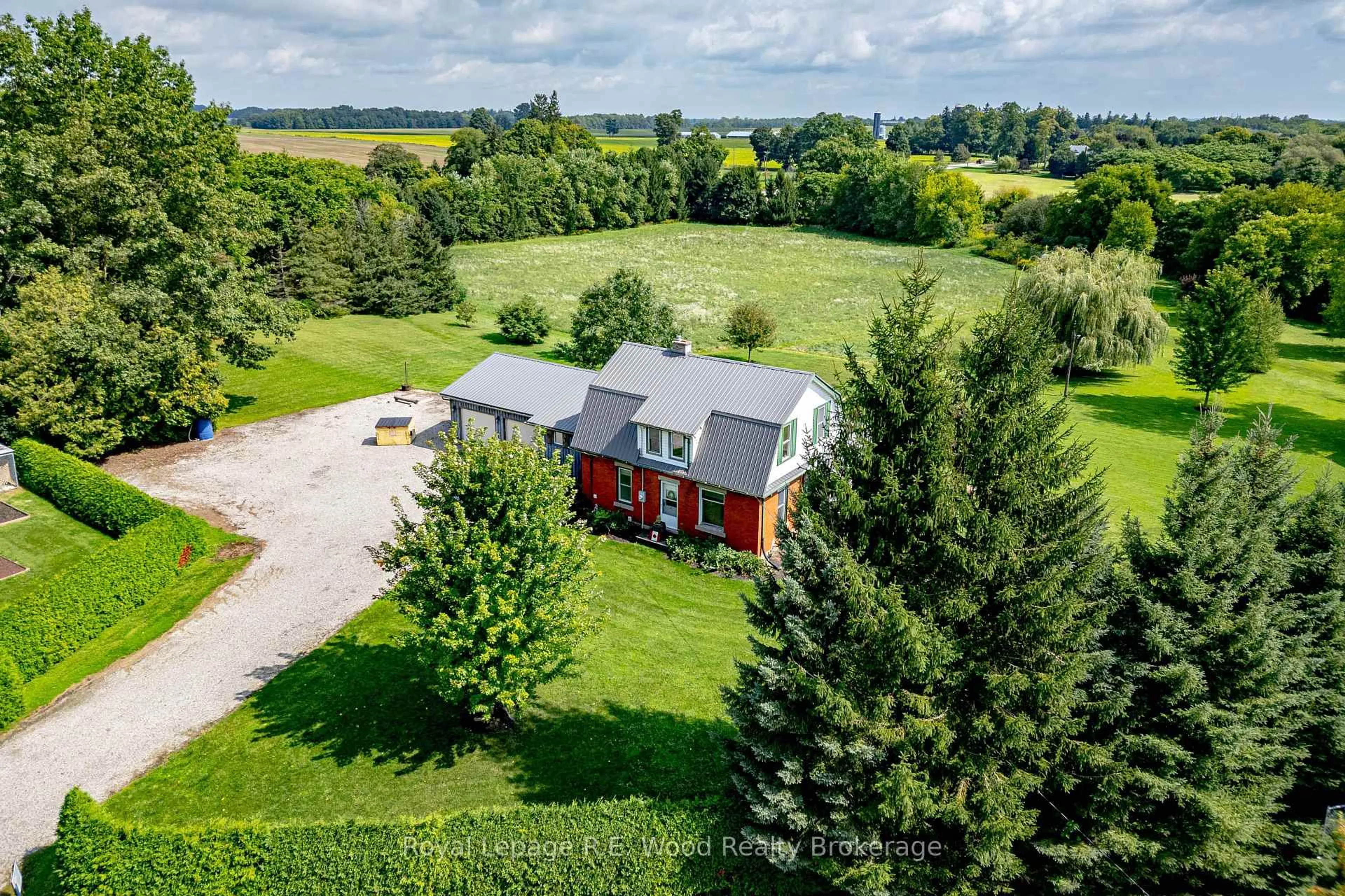 A pic from outside/outdoor area/front of a property/back of a property/a pic from drone, unknown for 325834 Norwich Rd, Norwich Ontario N0J 1P0