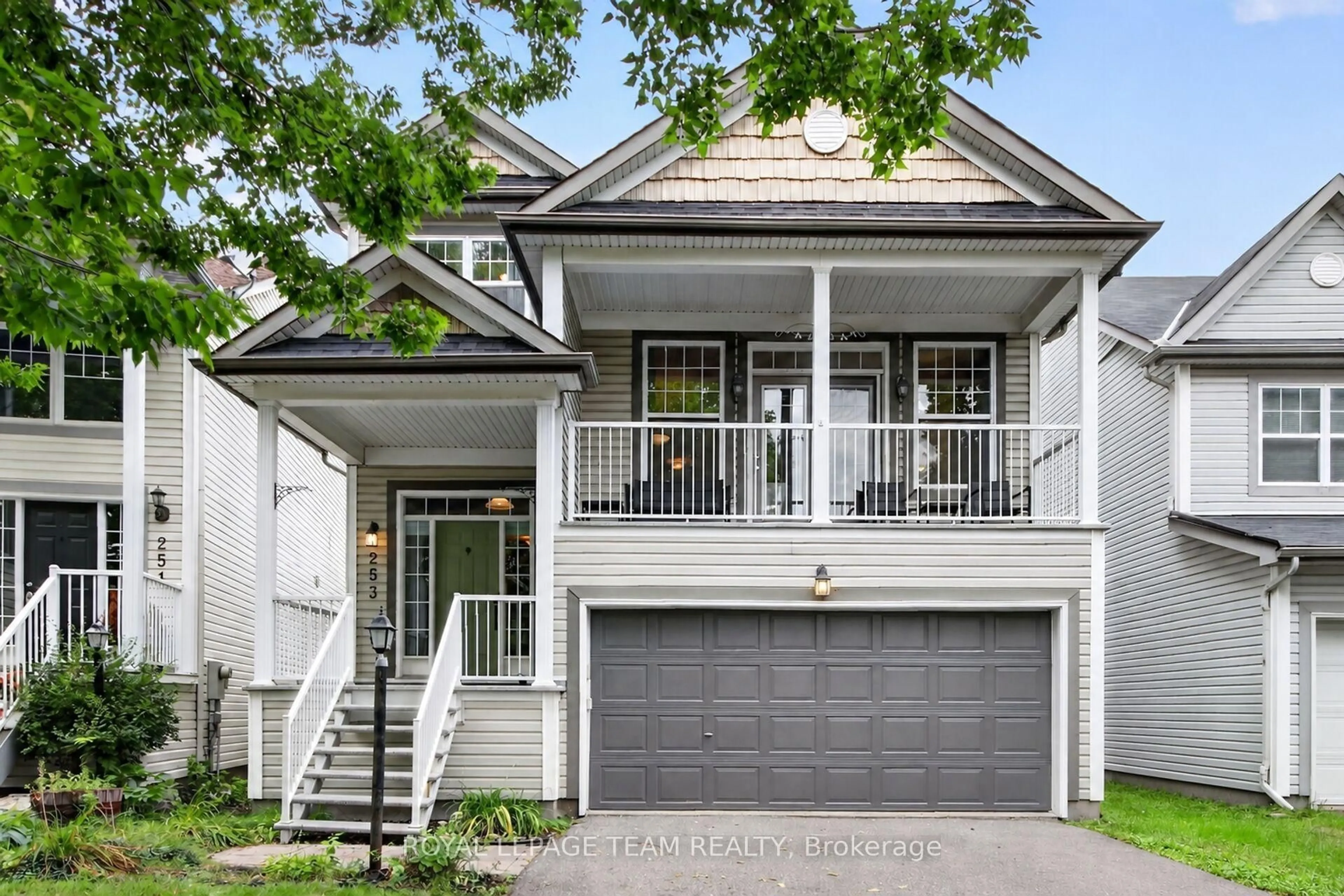 Home with vinyl exterior material, street for 253 Berrigan Dr, Ottawa Ontario K2J 5C4