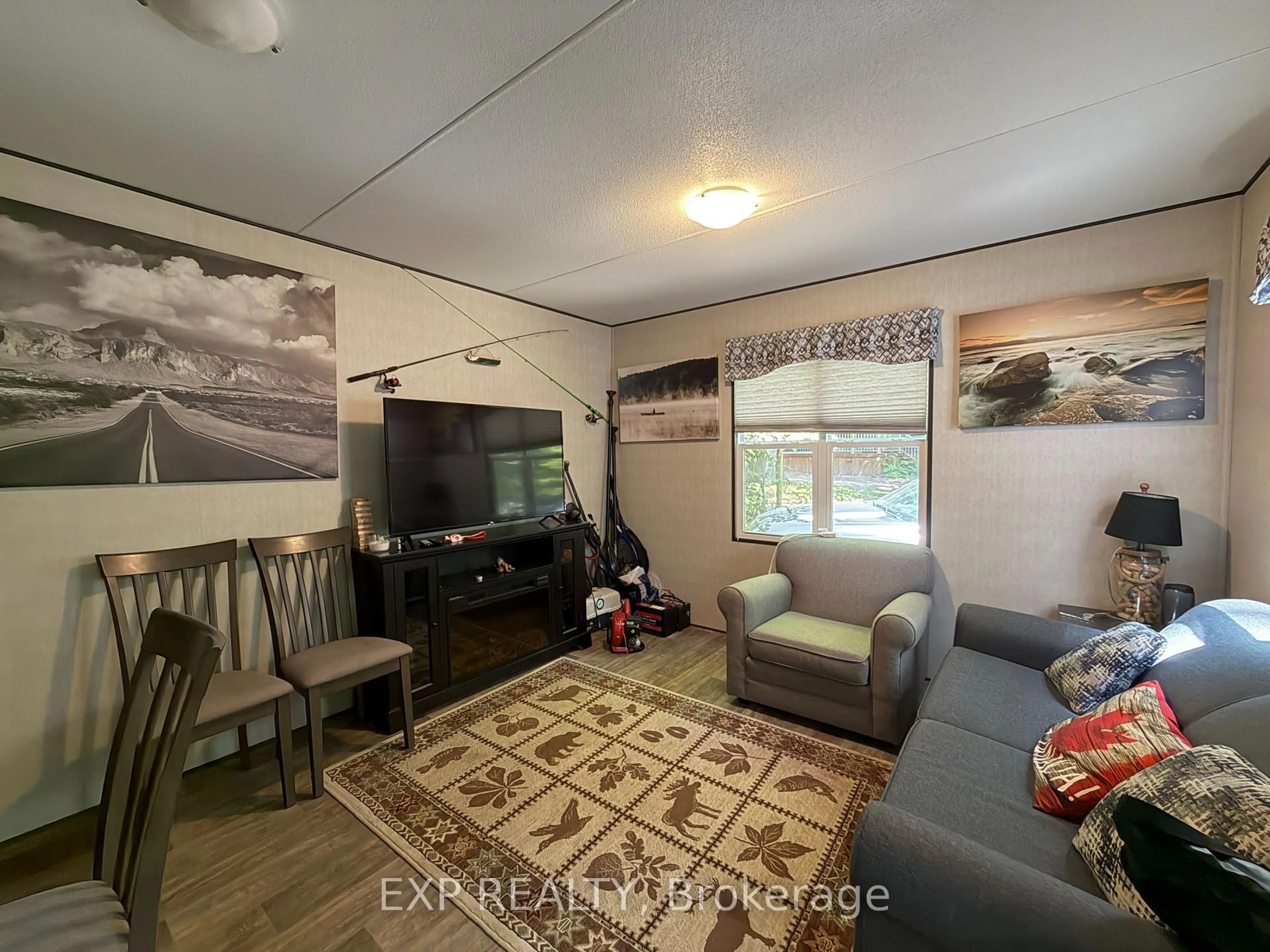 Living room with furniture, unknown for 1047 Bonnie Lake Camp Rd #740 Poplar Cres, Bracebridge Ontario P1L 1W9