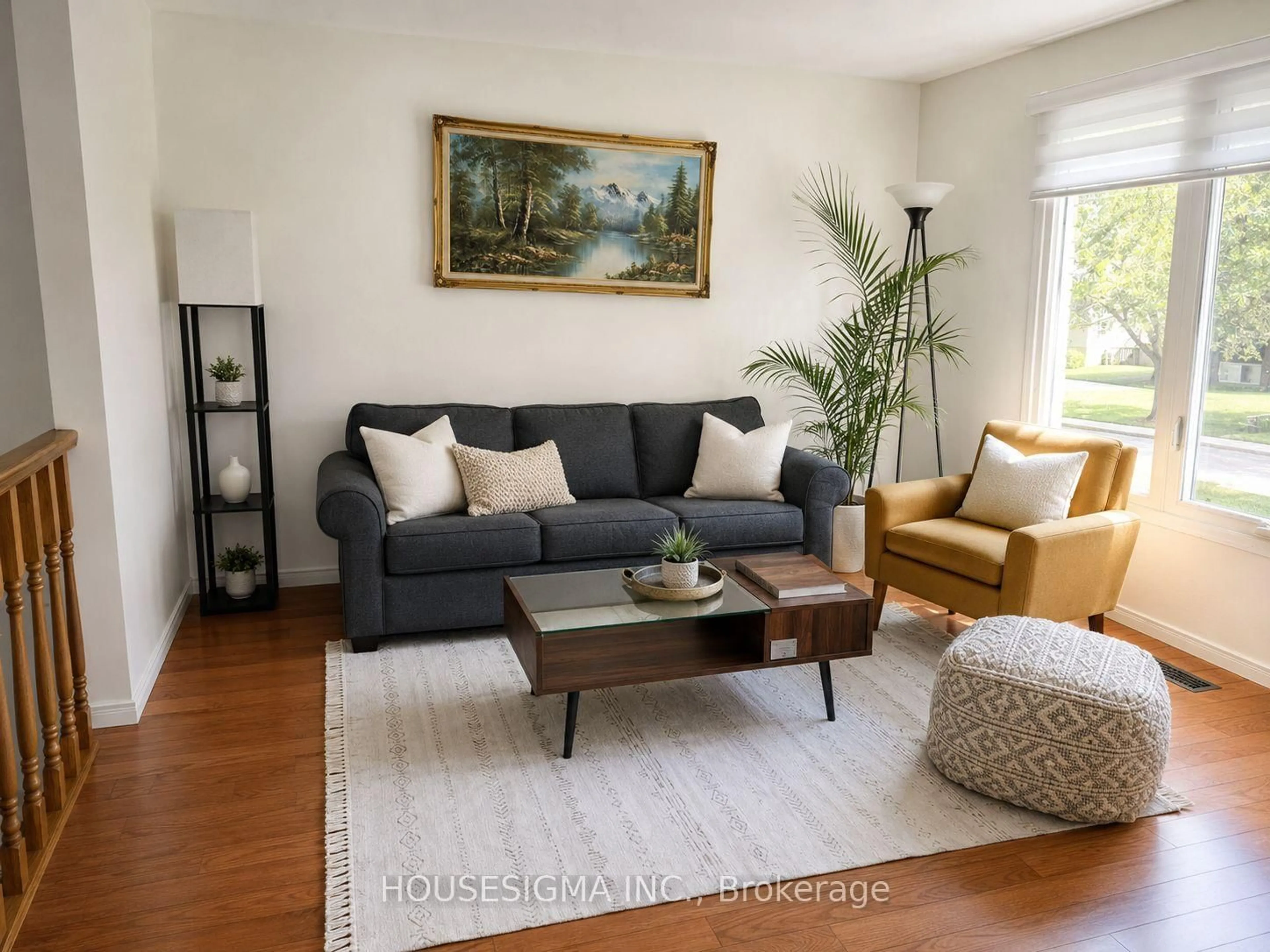 Living room with furniture, wood/laminate floor for 547 Barnes Cres, Peterborough Ontario K9J 7Z2