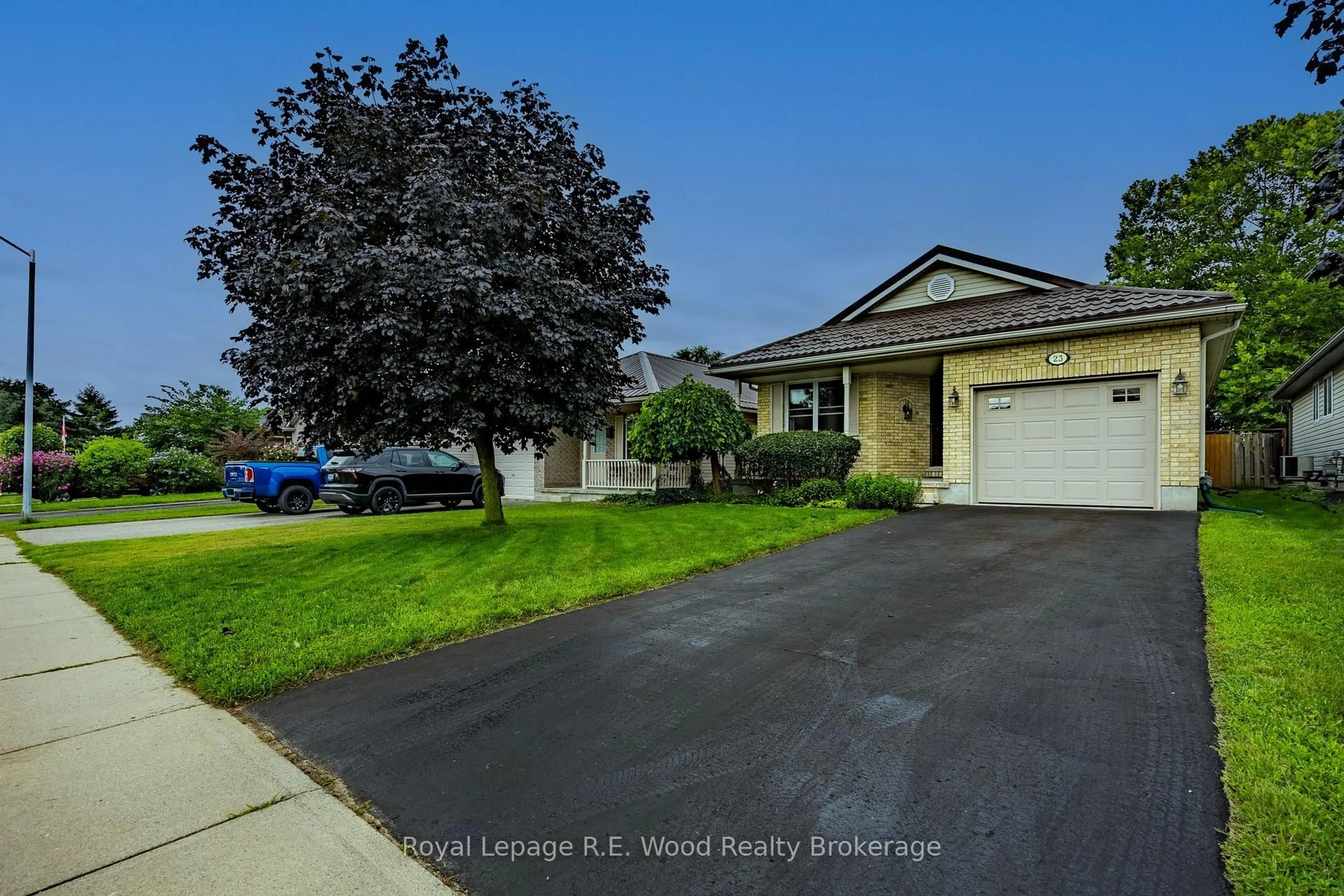 Home with vinyl exterior material, street for 23 Peach St, Tillsonburg Ontario N4G 5N8