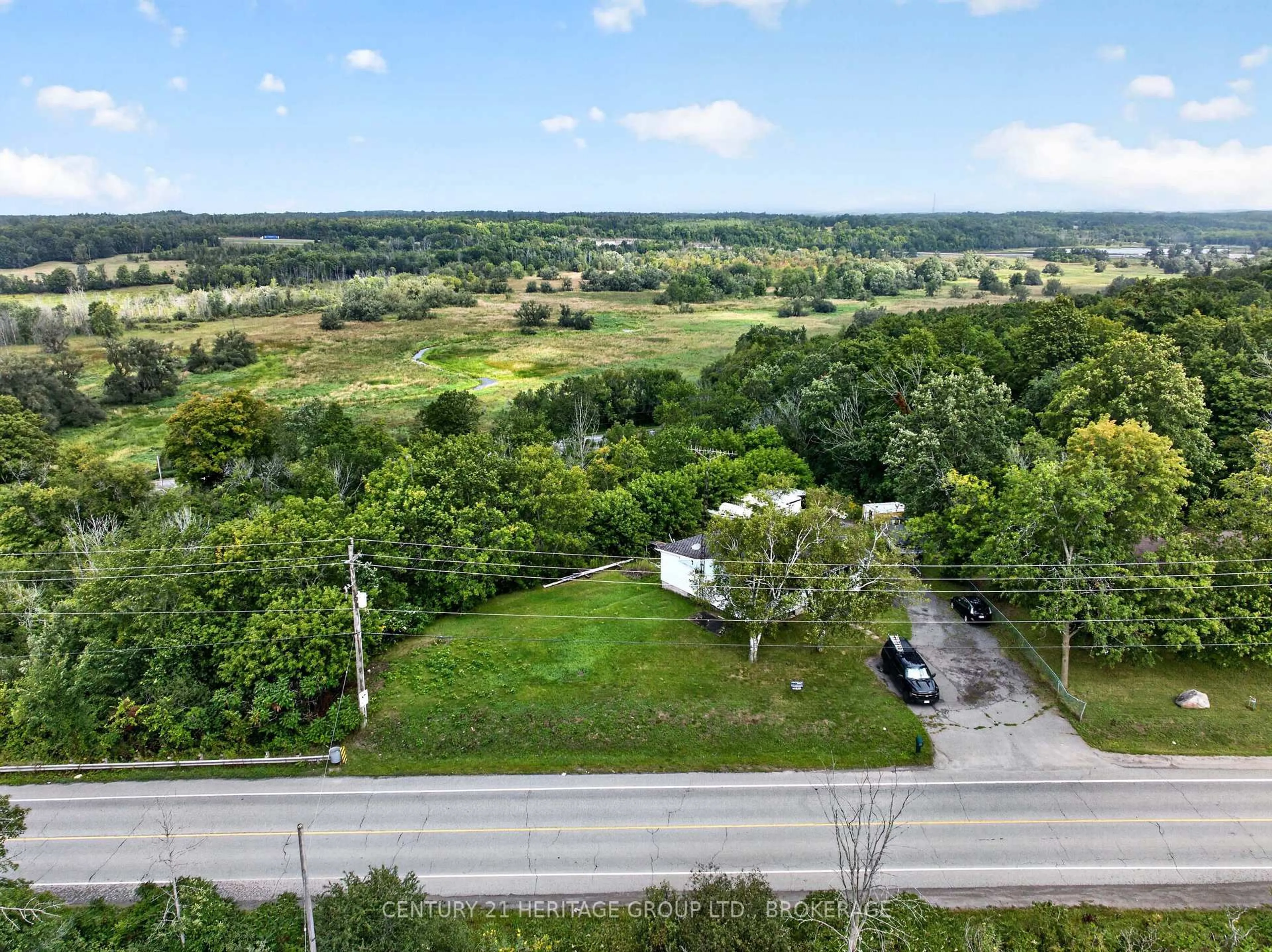 A pic from outside/outdoor area/front of a property/back of a property/a pic from drone, forest/trees view for 2886 Creekford Rd, Kingston Ontario K7P 2Z4