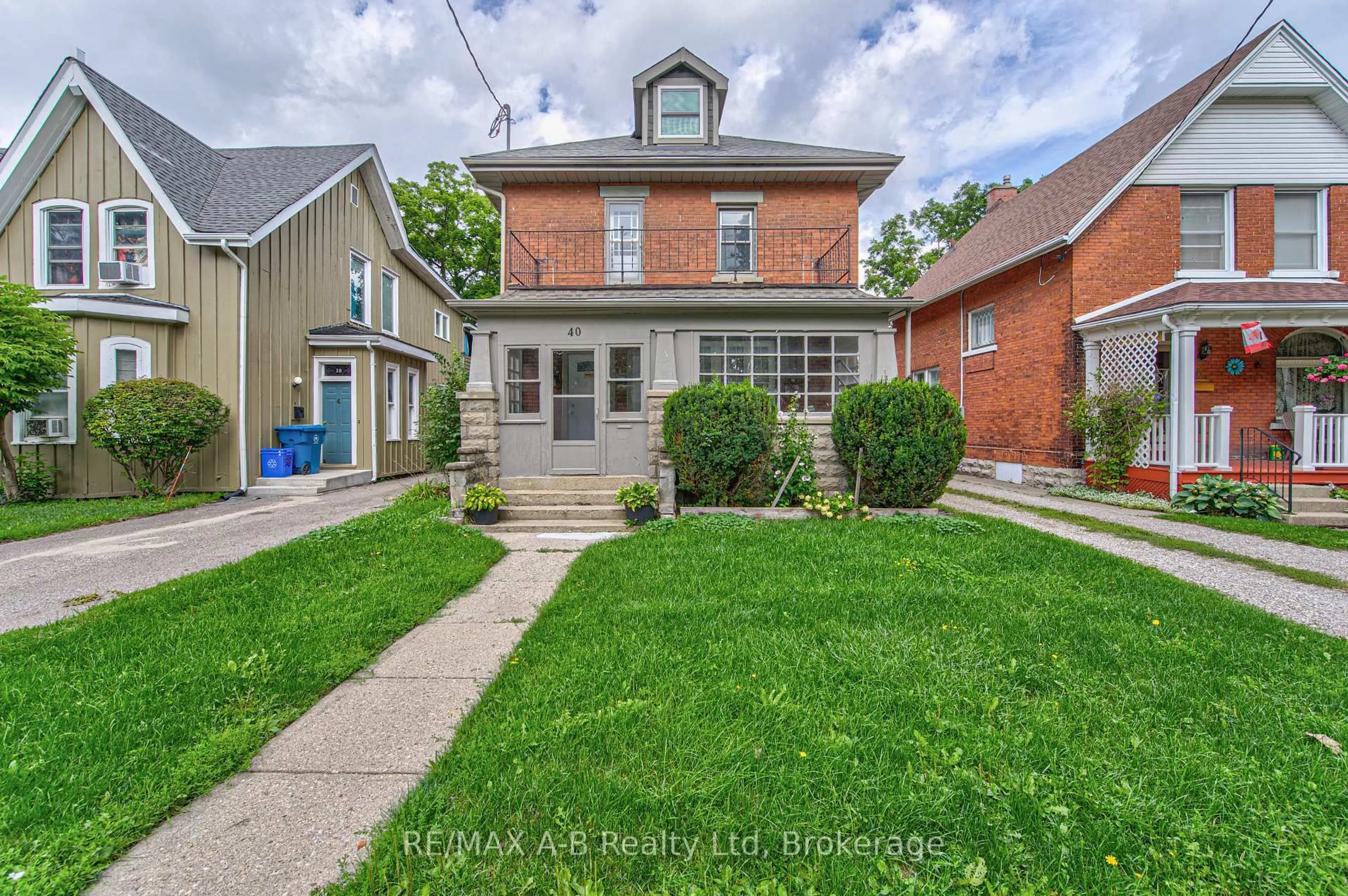 Home with brick exterior material, street for 40 Douro St, Stratford Ontario N5A 3R3