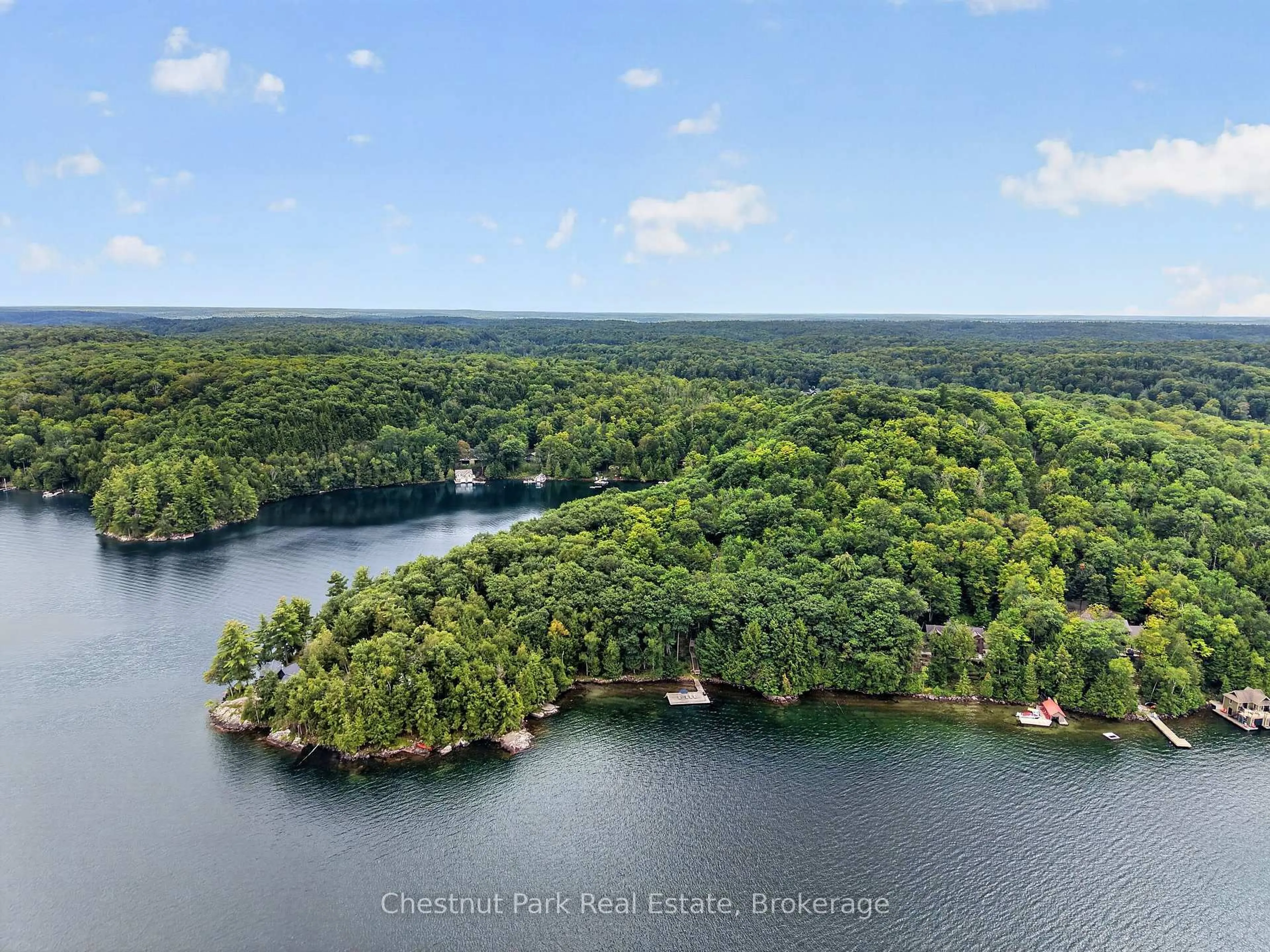 A pic from outside/outdoor area/front of a property/back of a property/a pic from drone, water/lake/river/ocean view for 1119 - 28 Skeleton Lake 2 Rd Rd, Muskoka Lakes Ontario P0B 1M0