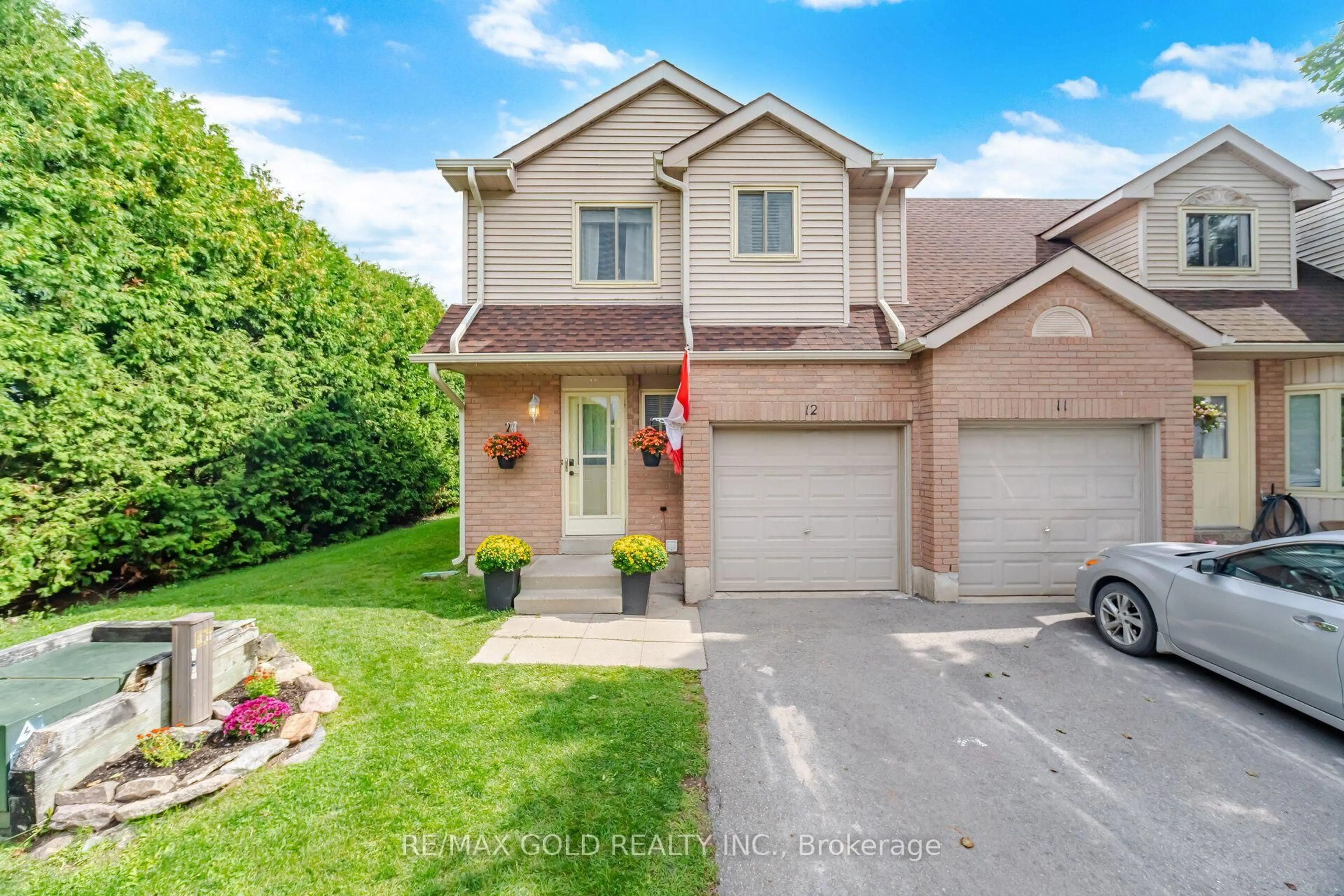 A pic from outside/outdoor area/front of a property/back of a property/a pic from drone, street for 65 Scott St #12, East Luther Grand Valley Ontario L9W 5X3