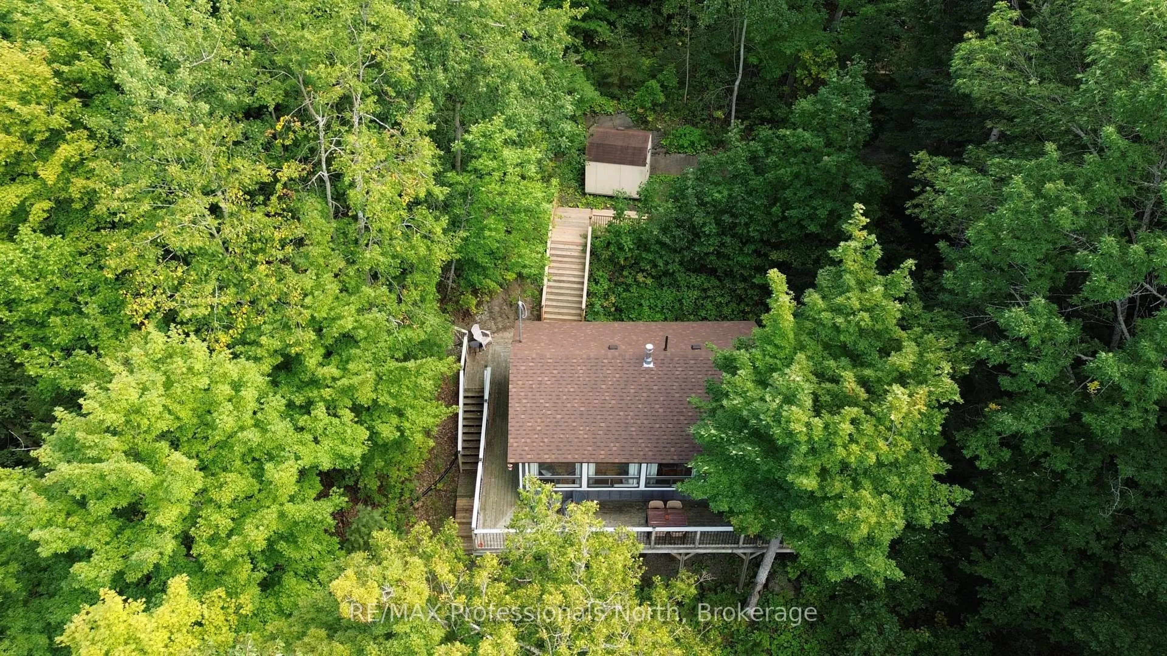 A pic from outside/outdoor area/front of a property/back of a property/a pic from drone, forest/trees view for 1258-2 Windemere Rd, Muskoka Lakes Ontario P0B 1M0