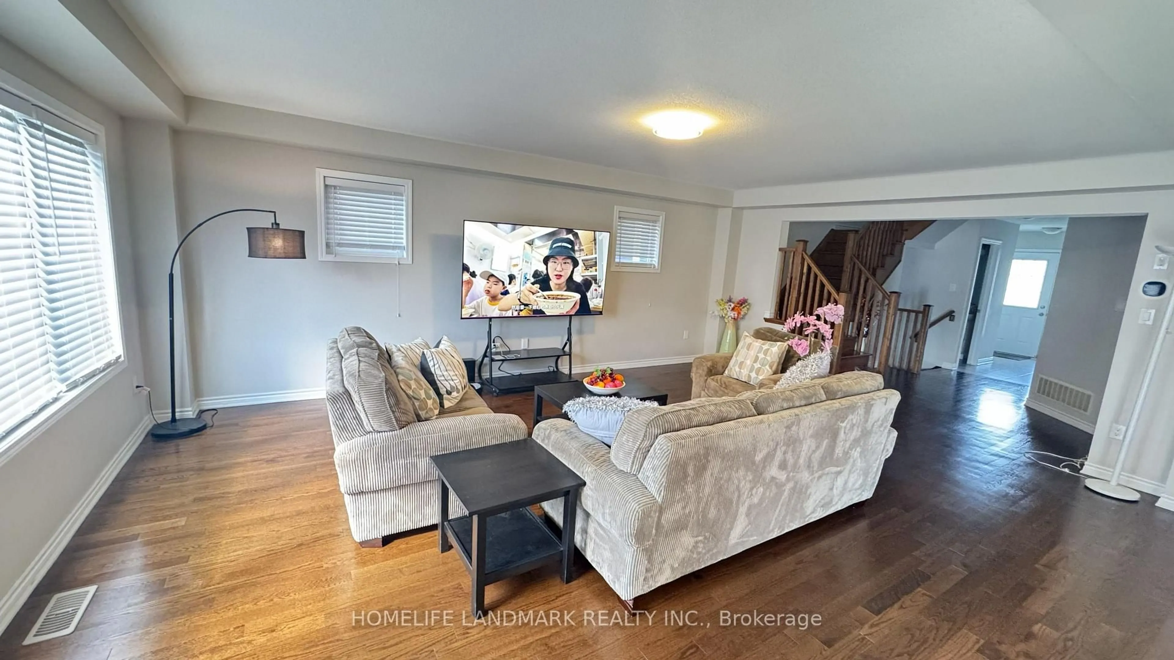 Living room with furniture, wood/laminate floor for 67 Pointer St, Cambridge Ontario N3E 0B4