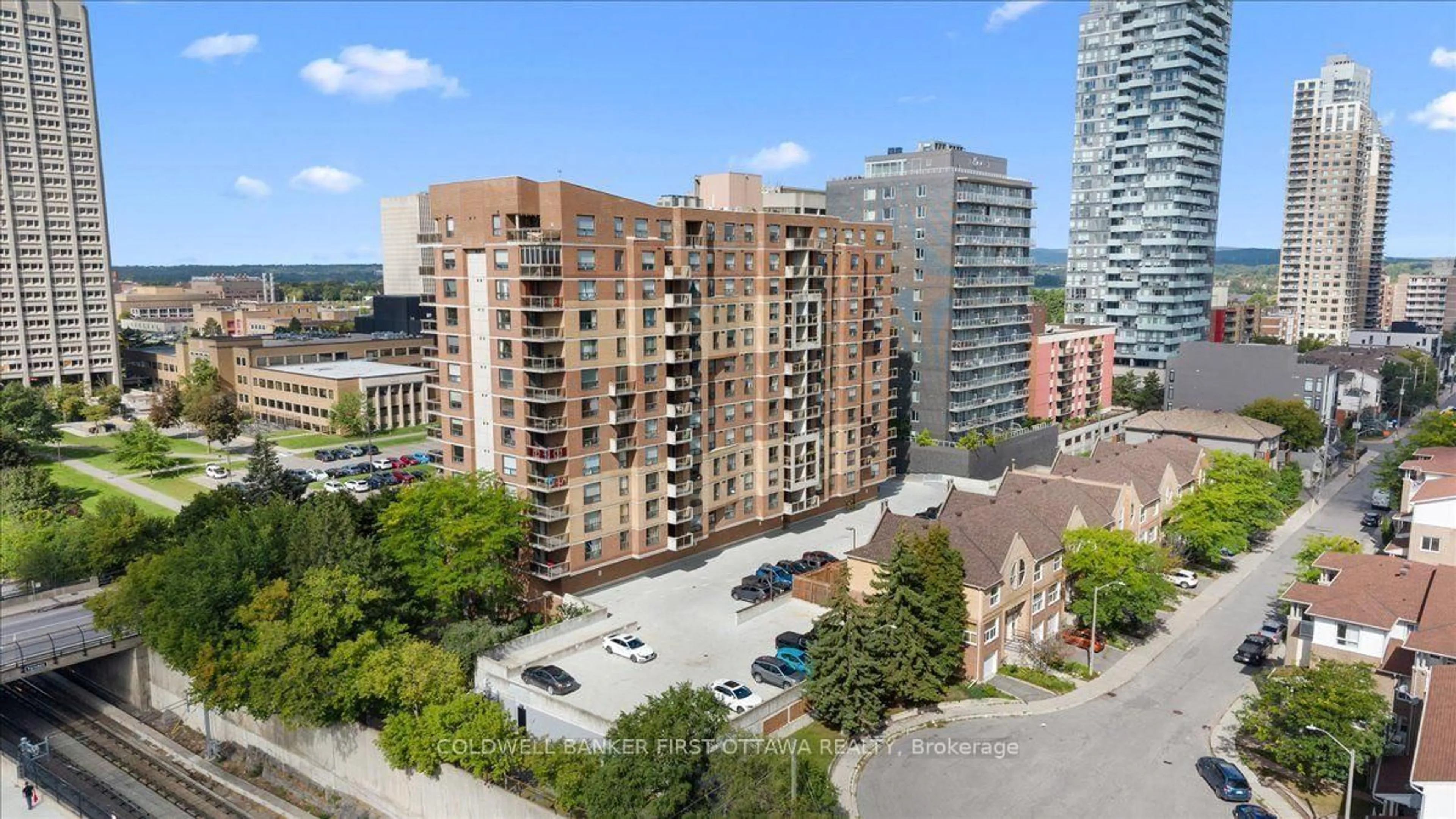 A pic from outside/outdoor area/front of a property/back of a property/a pic from drone, city buildings view from balcony for 215 Parkdale Ave #1202, Ottawa Ontario K1Y 4T8