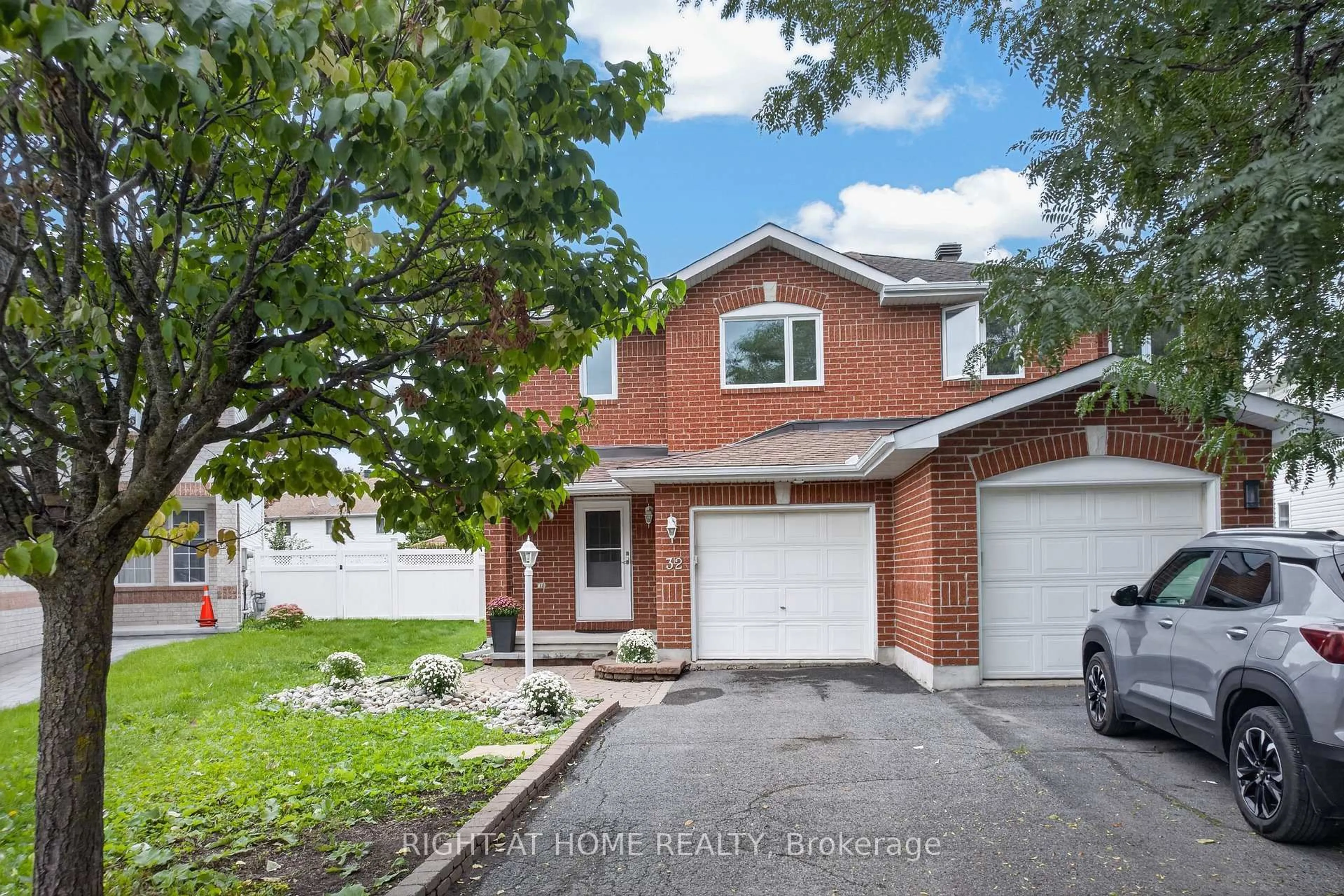 Home with brick exterior material, street for 32 Saffron Crt, Ottawa Ontario K2J 4R7