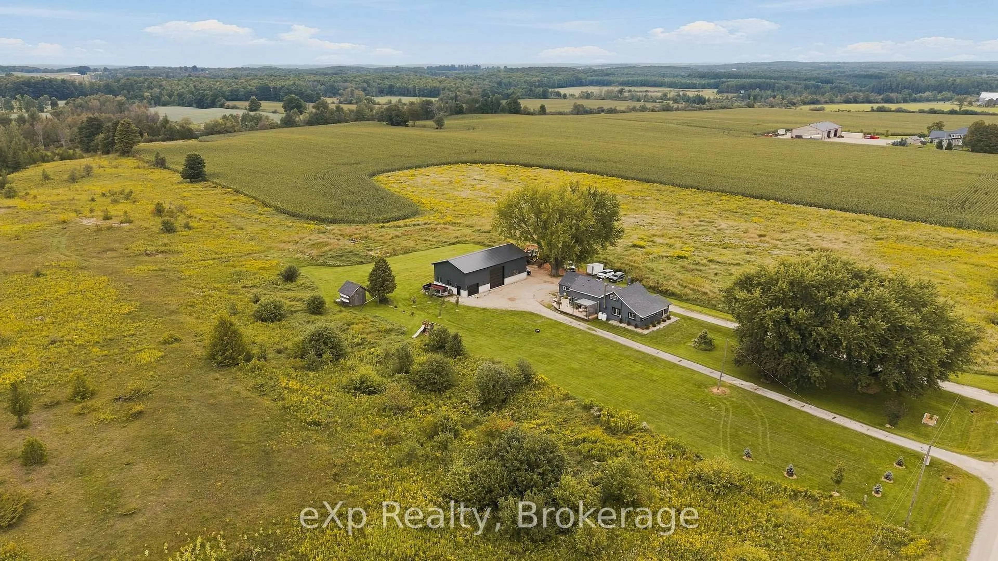 A pic from outside/outdoor area/front of a property/back of a property/a pic from drone, water/lake/river/ocean view for 325789 Durham B Rd, Grey Highlands Ontario N0C 1K0